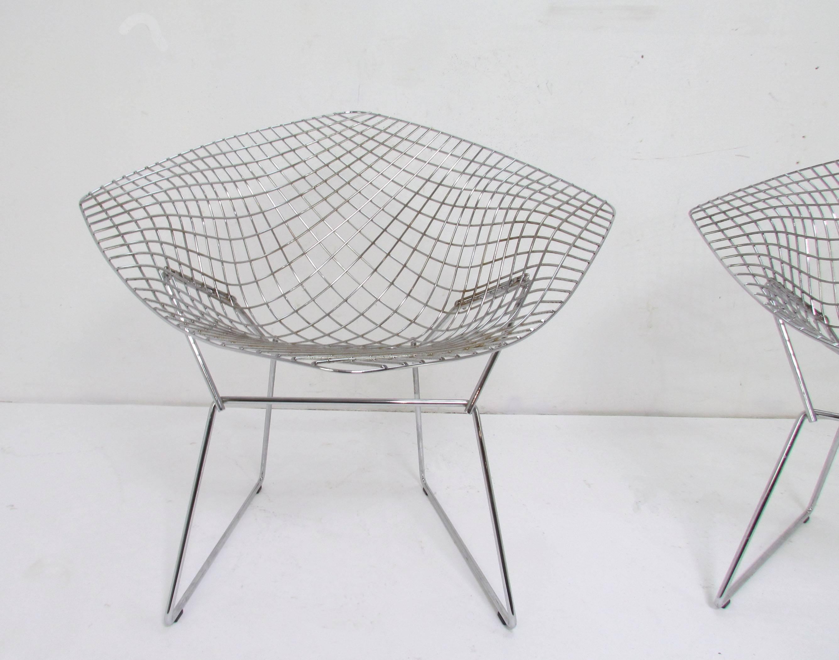 Pair of Classic diamond chairs by Harry Bertoia for Knoll in chrome finish, designed in 1952, this pair, circa 1980s production.