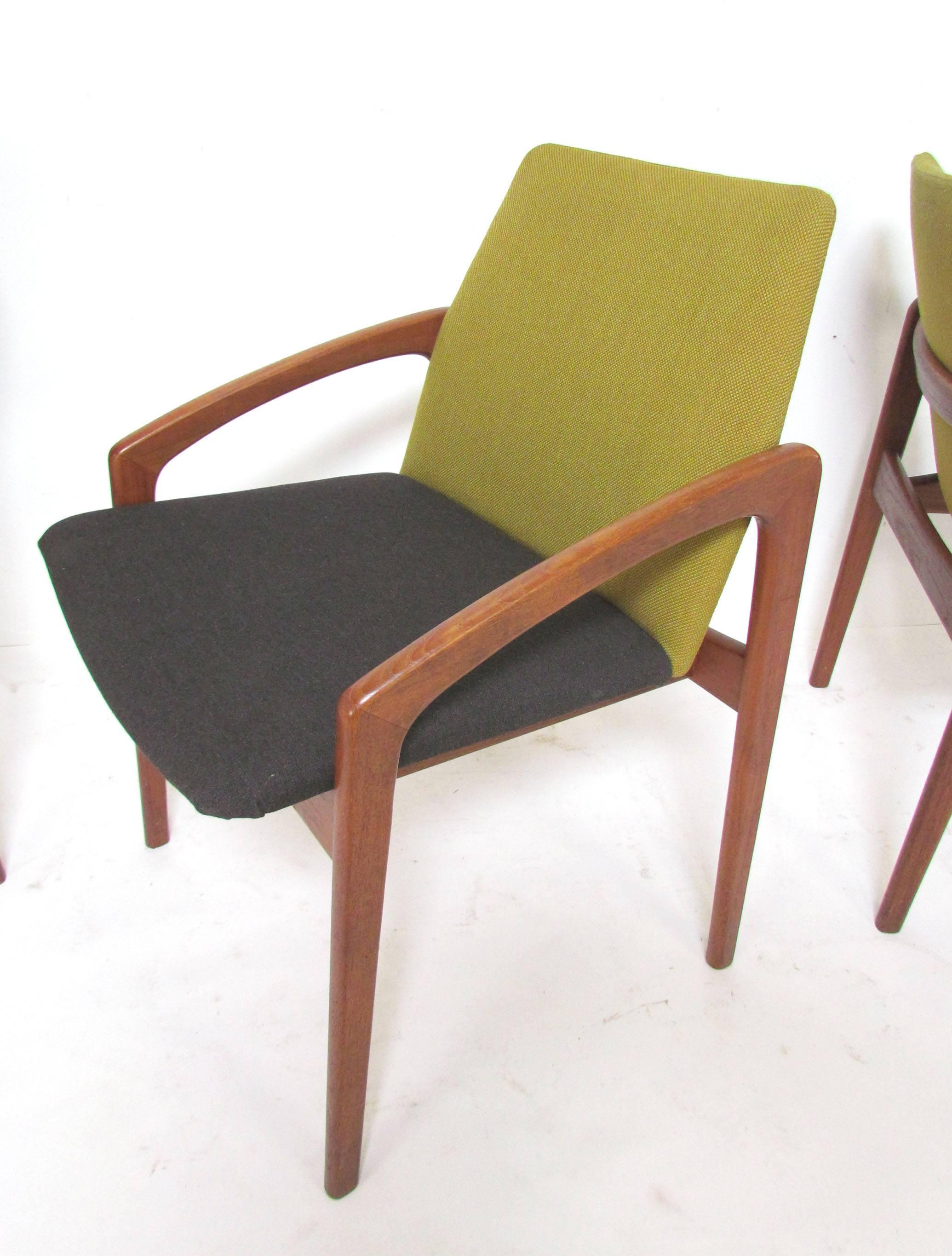 Set of six teak dining chairs with gracefully canted arms by Kai Kristiansen for K.S. Mobler, Denmark, ca. 1960s.