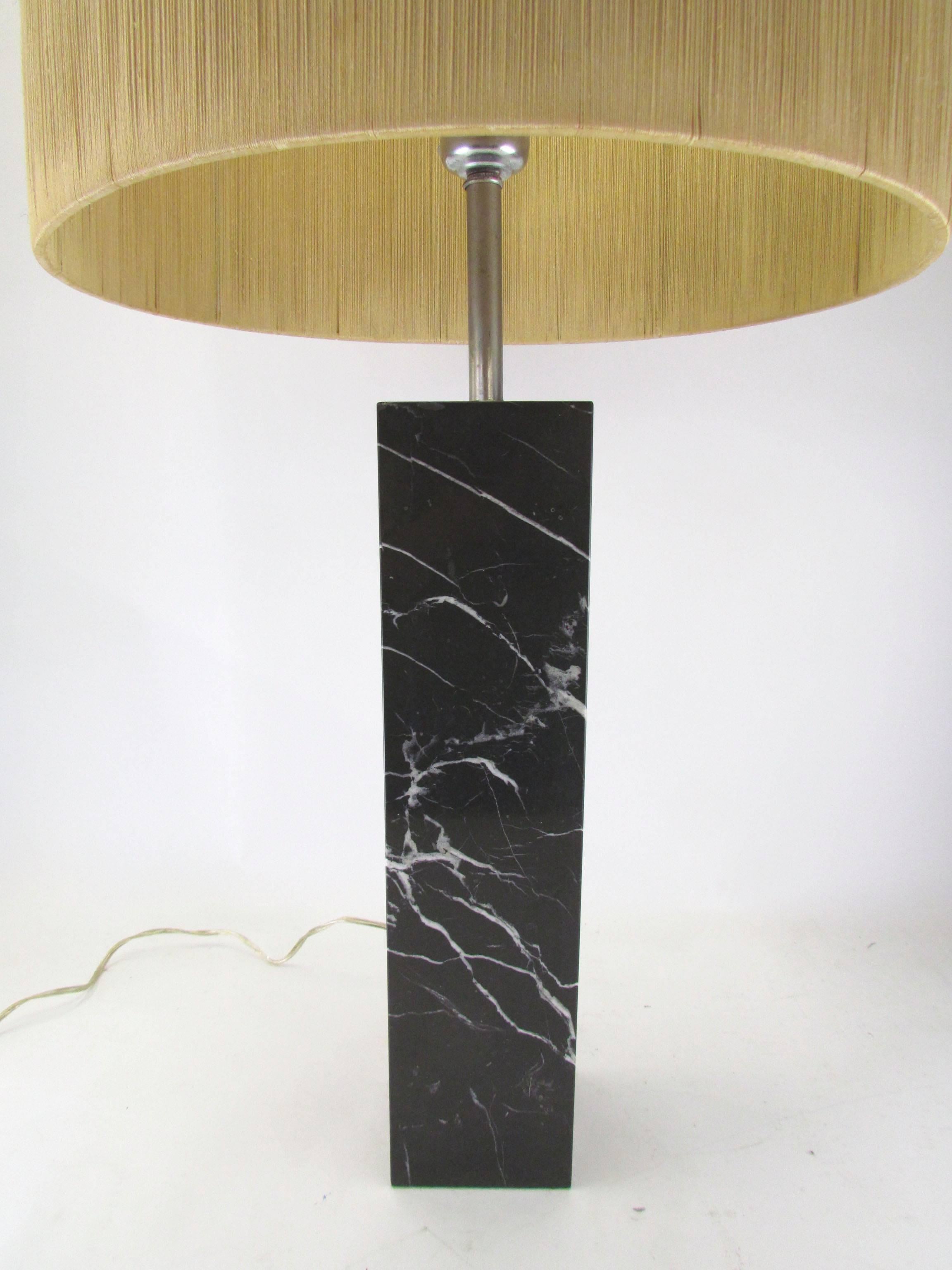 Large-scale rectangular marble table lamp by Nessen Studios, with original milk glass diffuser and original string shade.

Overall height with shade: 37