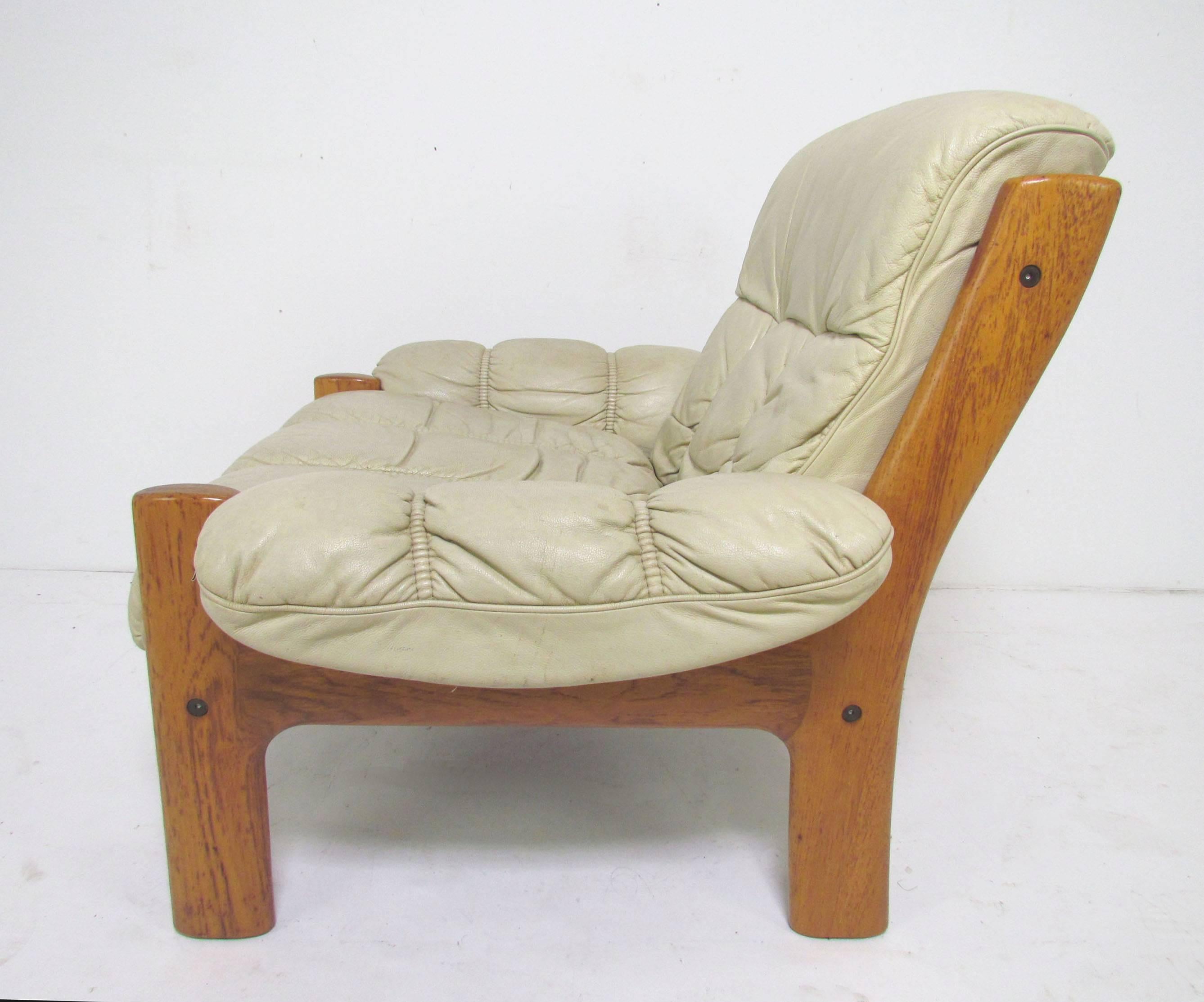 Oversize lounge chair, teak frame with original leather upholstery, by J.E. Ekornes, Norway, circa 1970s.