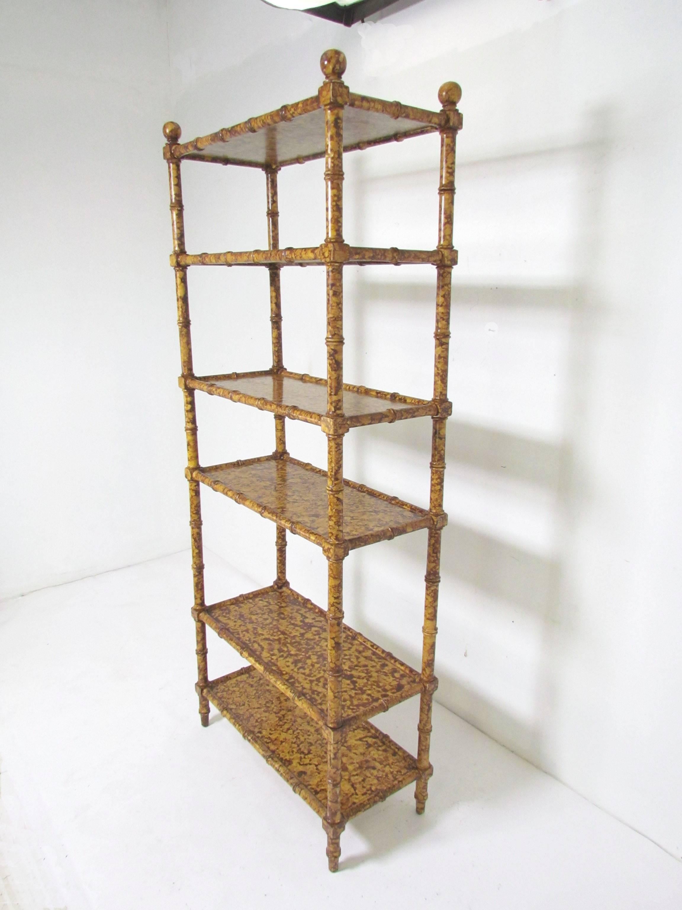 Display shelf Etagere in faux bamboo with a tortoise shell finish, circa 1970s.