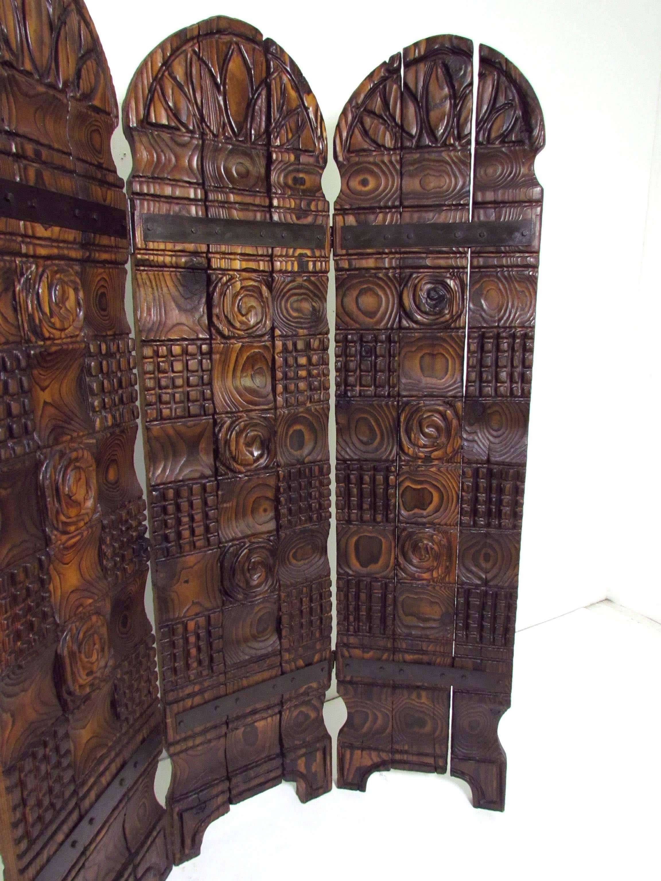 Rare decorative three-panel screen in the hand-carved wood tiki or Polynesian style for which Witco is known. 

Finished on the back but not with the same carvings.

Each panel measures 17.5