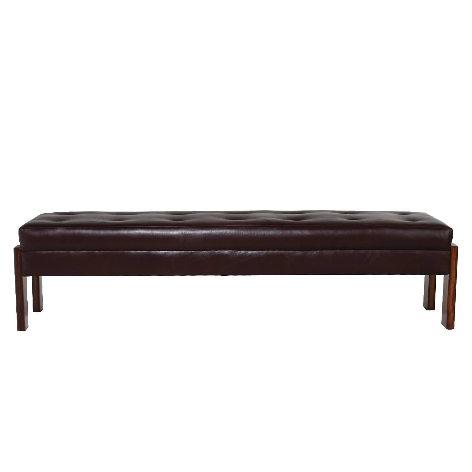 Bench by Jorge Zalszupin for L'Atelier with solid Caviuna wood sides and leather tufted seat. Many pieces are stored in our warehouse, so please click on 