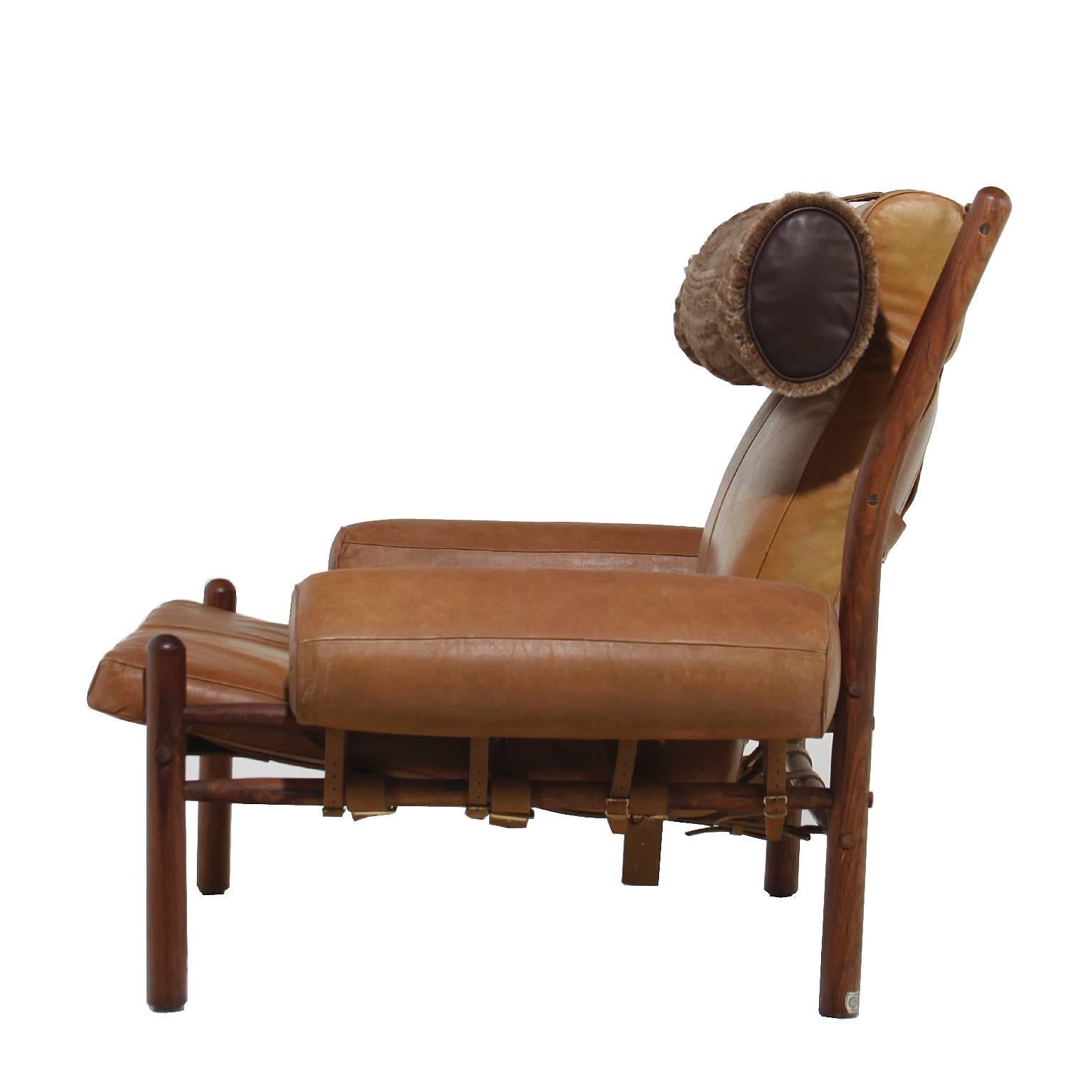 Brazilian Armchair and Ottoman with Cognac Leather and Faux Fur Pillow by Arne Norell