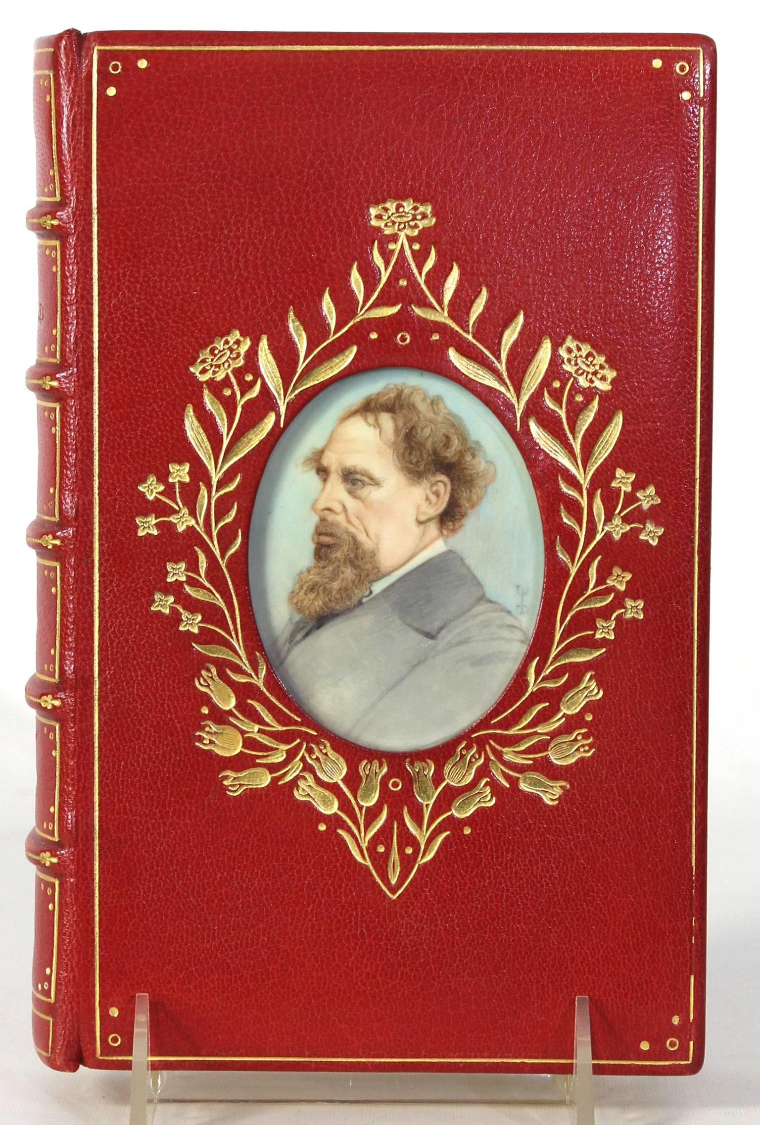 A spectacular first edition David Copperfield by Charles Dickens in fine red leather cosway binding inset with hand-painted portrait miniature of the author.