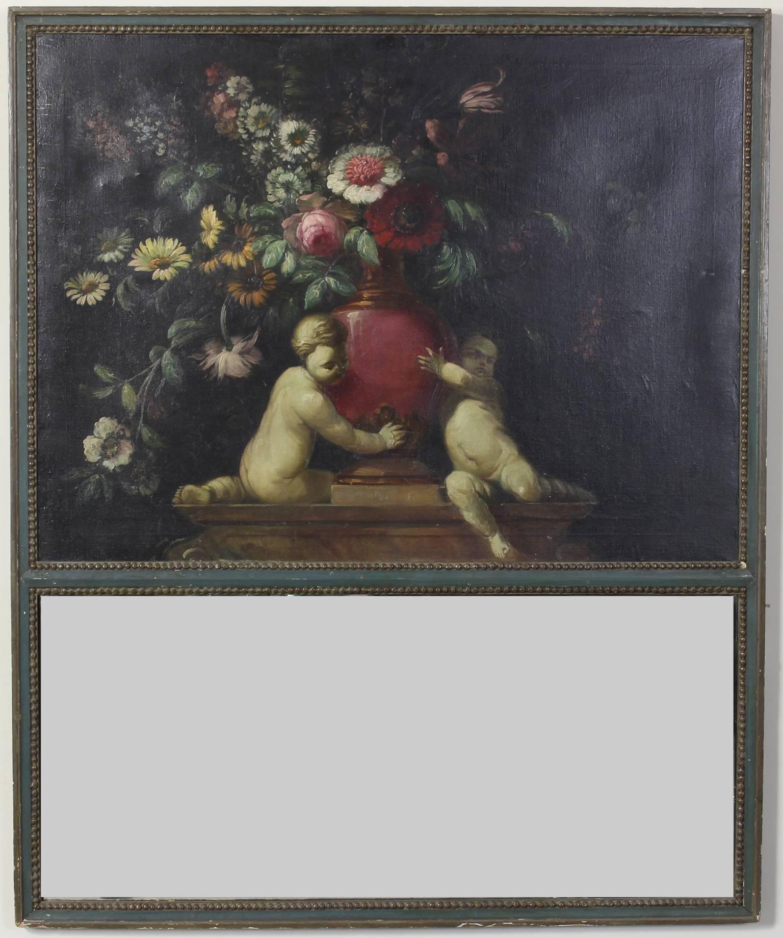A large late 19th century French trumeau mirror. The upper painting depicting Putti holding a vase of flowers, the lower panel holds a mirror.