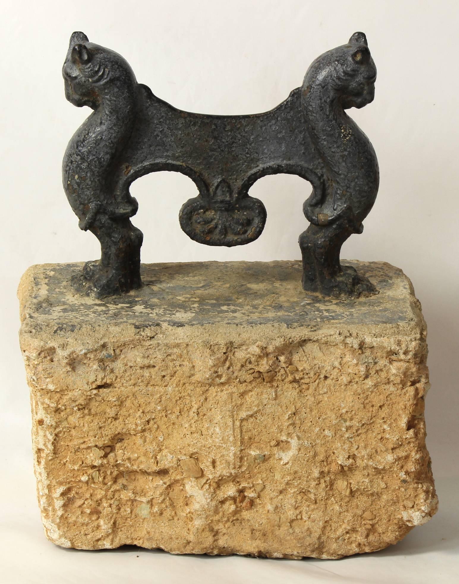 A large and impressive early 19th century English cast iron boot scrape in the form of lions.