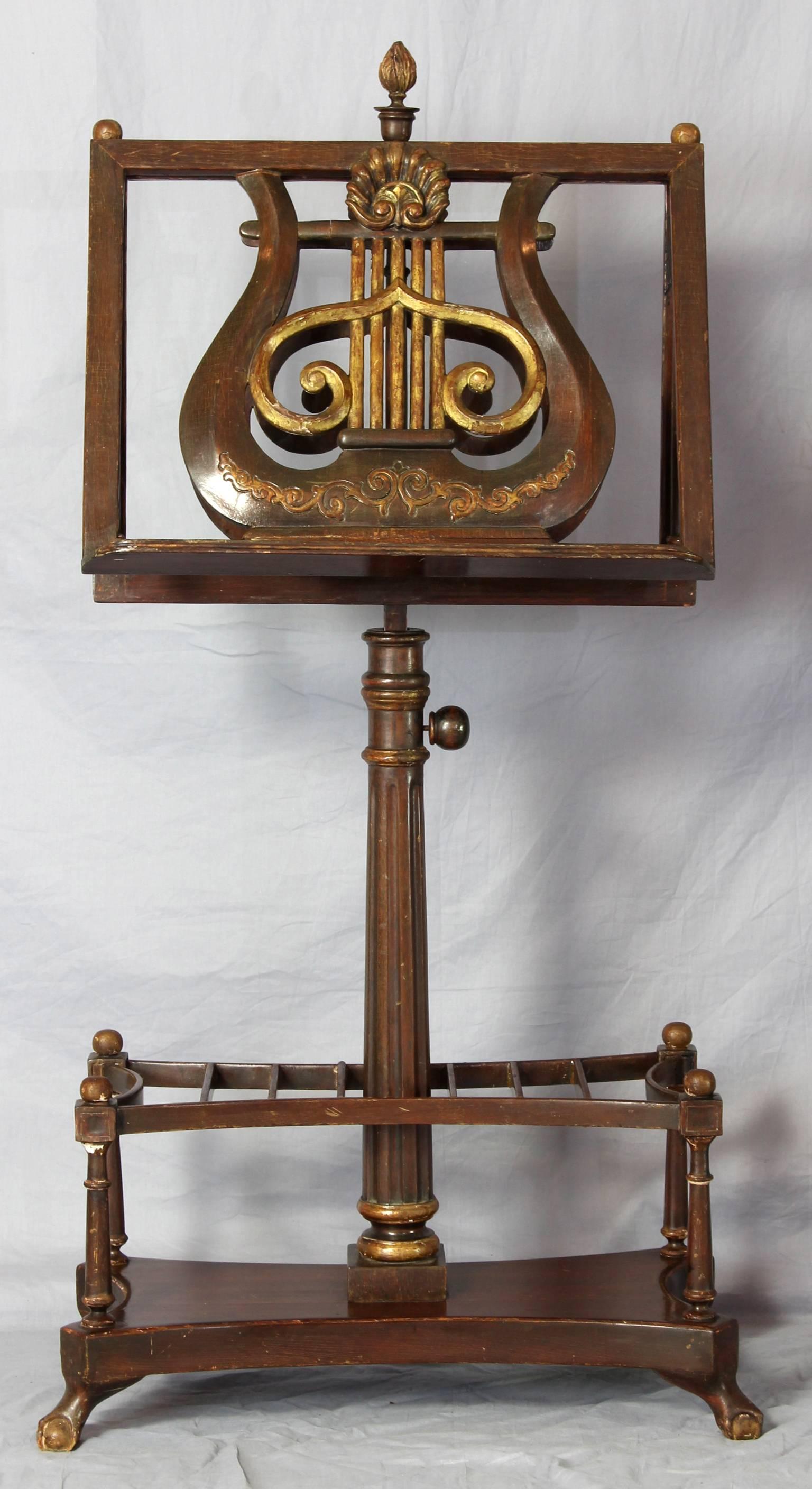 An unusual early 19th century English Regency duet Stand and combination music rack. The fluted Stand holds an adjustable music rest with lyre form decoration.