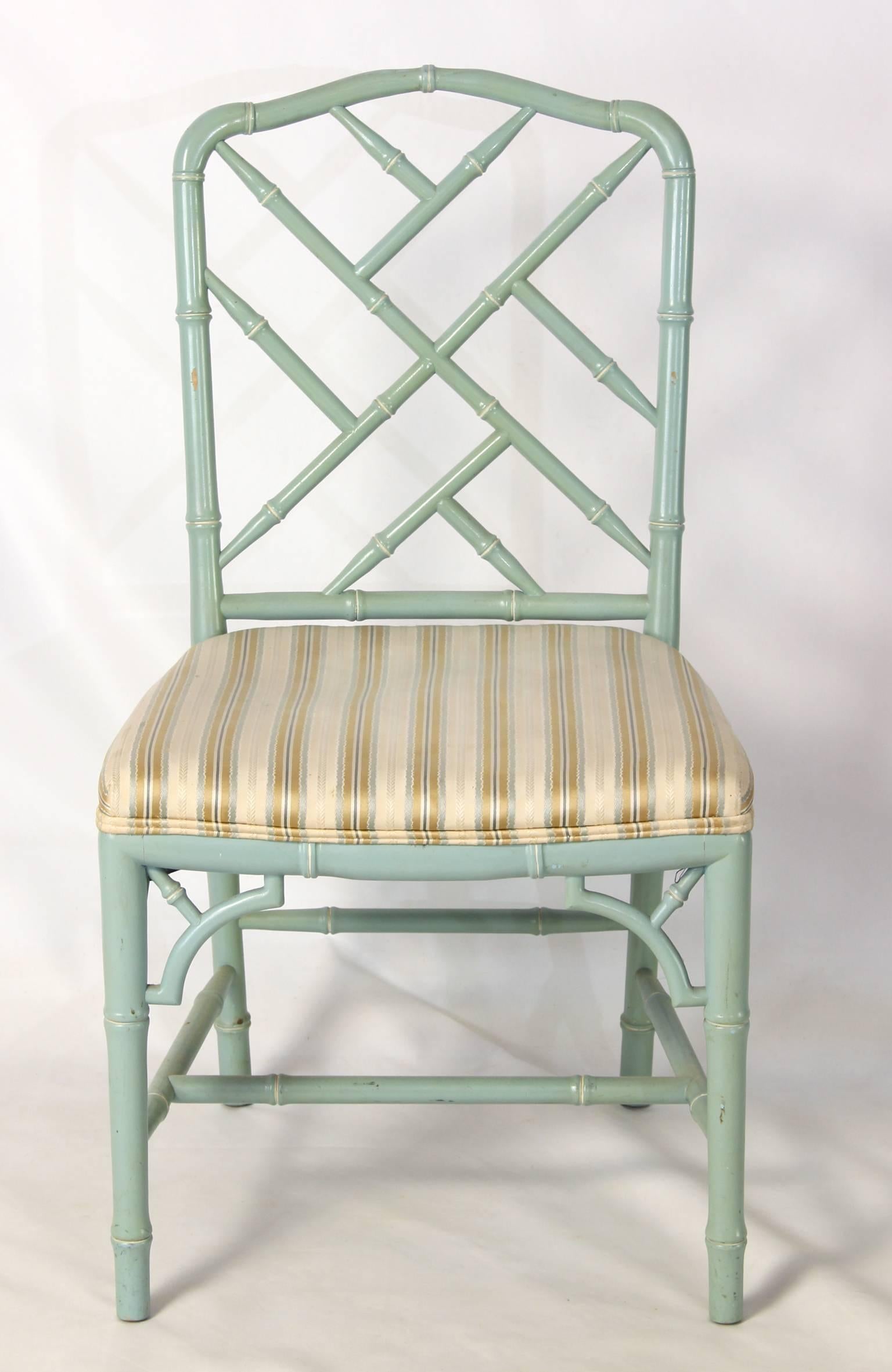 A stunning set of ten robin's egg blue Chinese Chippendale dining chairs of good design and sturdy construction with arched back and bracketed front legs. The close up image of the leg shows the most accurate color representation.