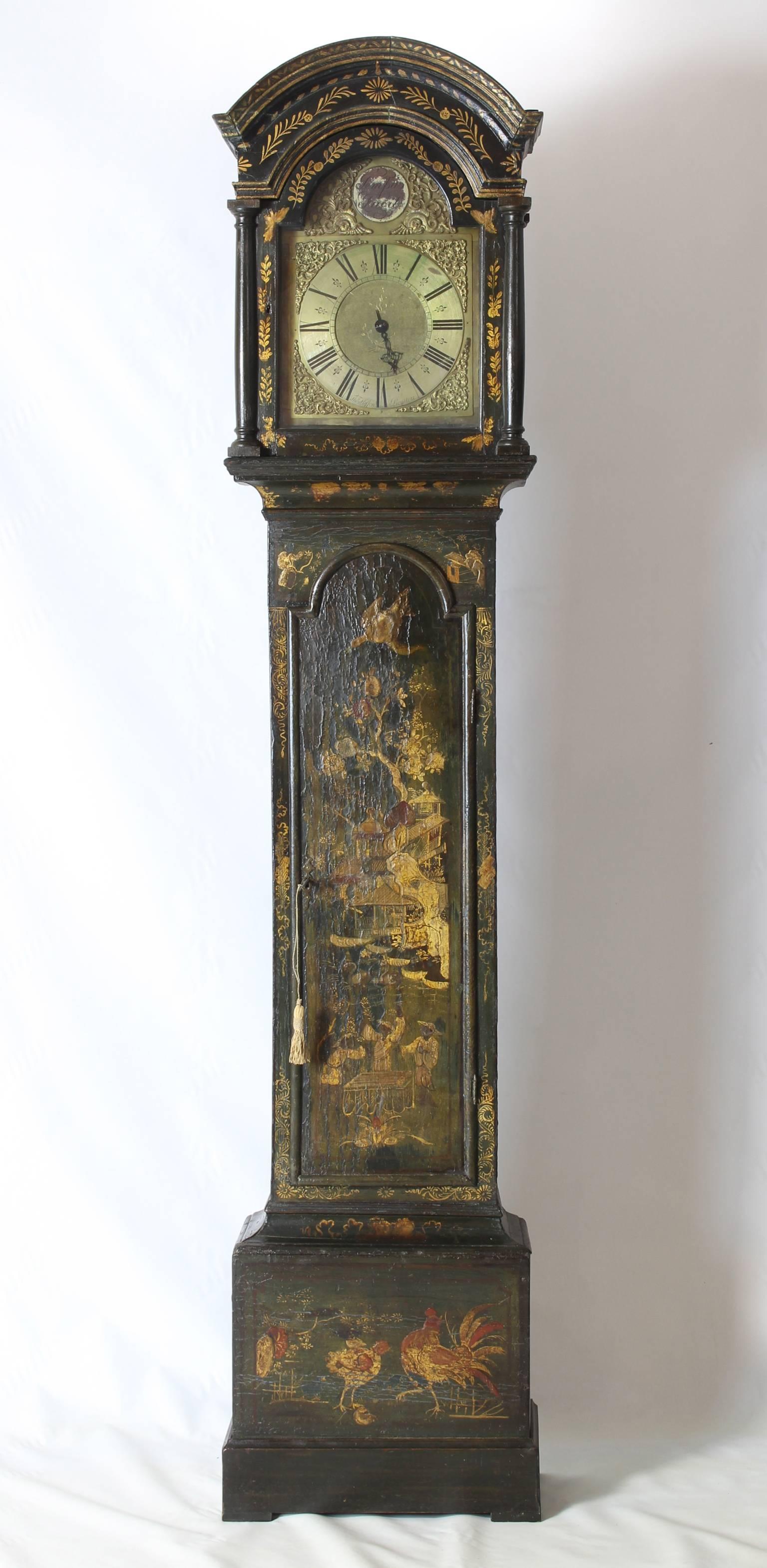 A tall and elegantly proportioned late 18th century English dark green chinoiserie decorated long case clock with 30 hour movement by Thomas Hefford, Royston.