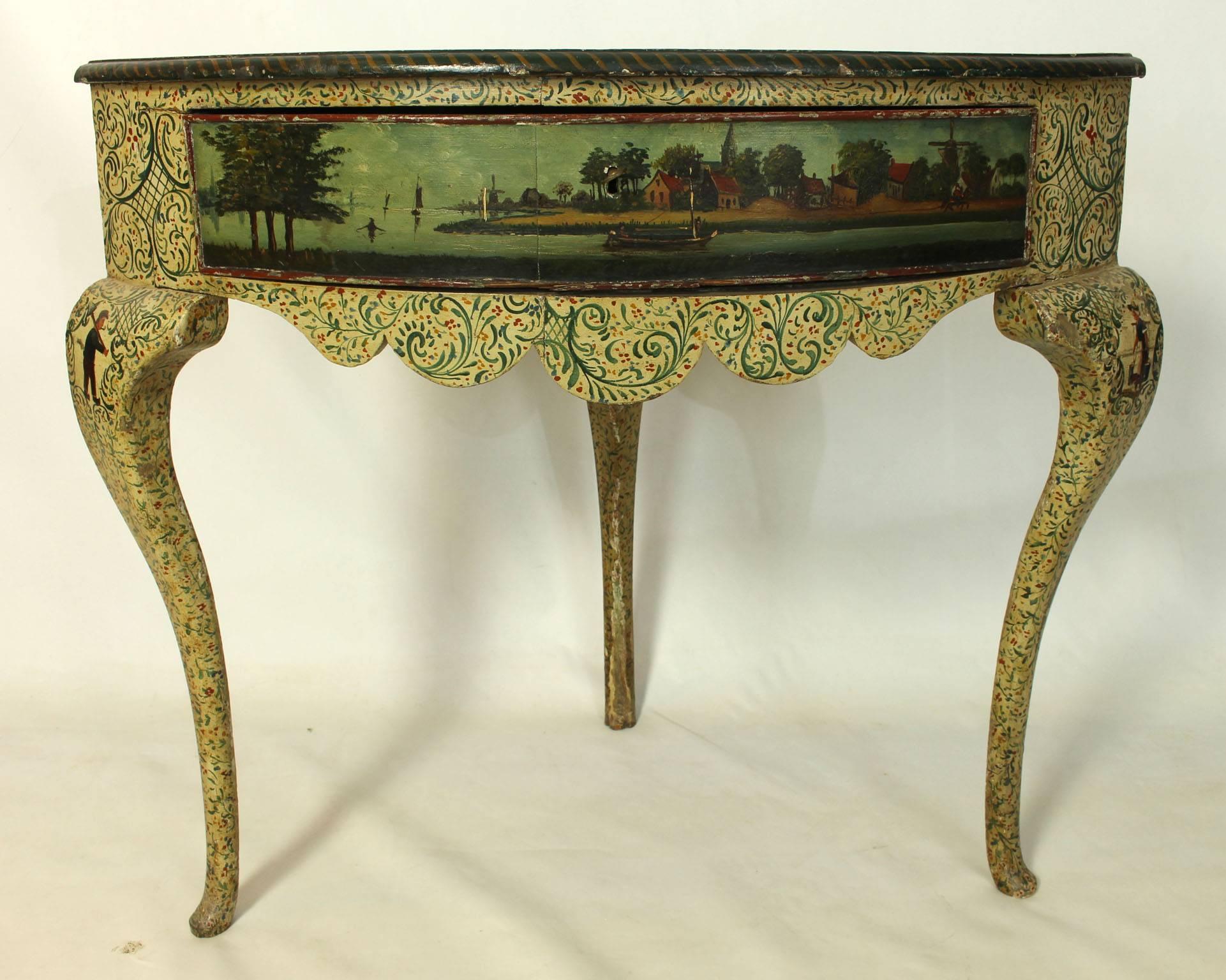 A charming early 19th century Continental paint decorated corner table supported by three graceful cabriole legs. The surface with trailing vines and flowers, village scenes with windmills and peasants wearing wooden shoes.