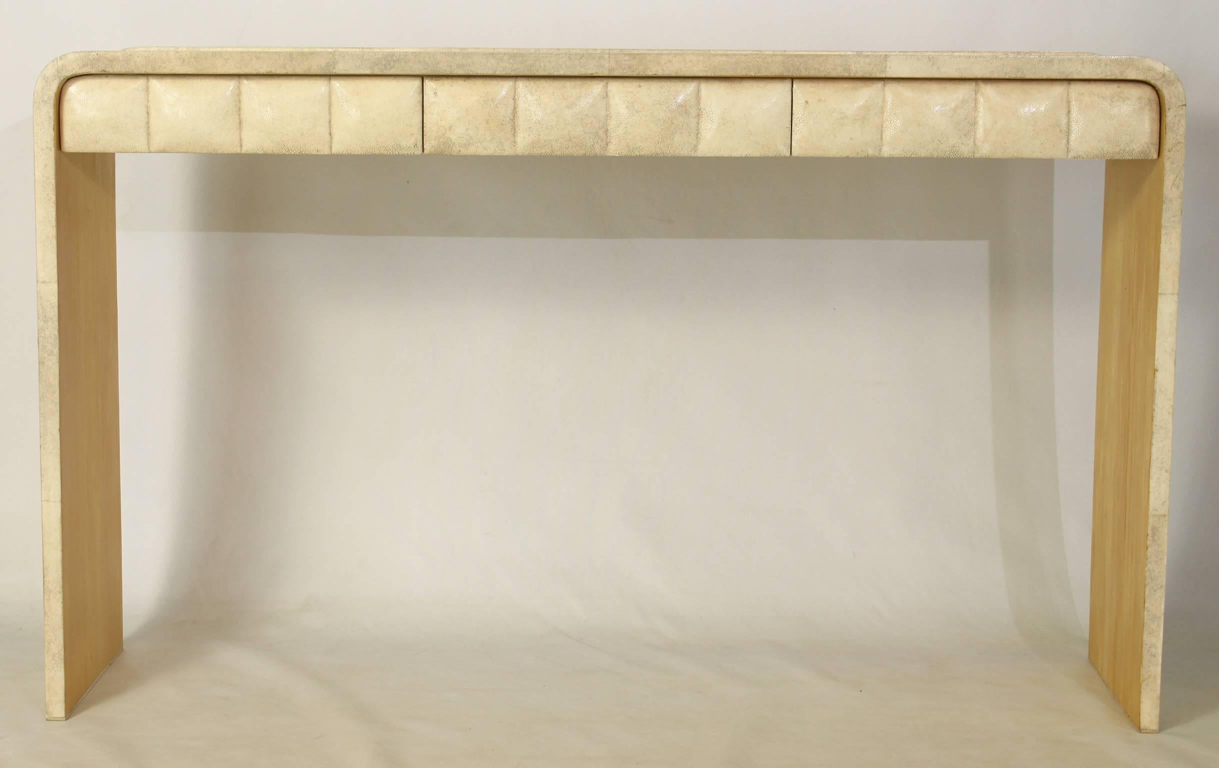 An elegant Art Deco inspired shagreen and parchment covered console table made in Paris in the 1980s by R & Y Augousti.