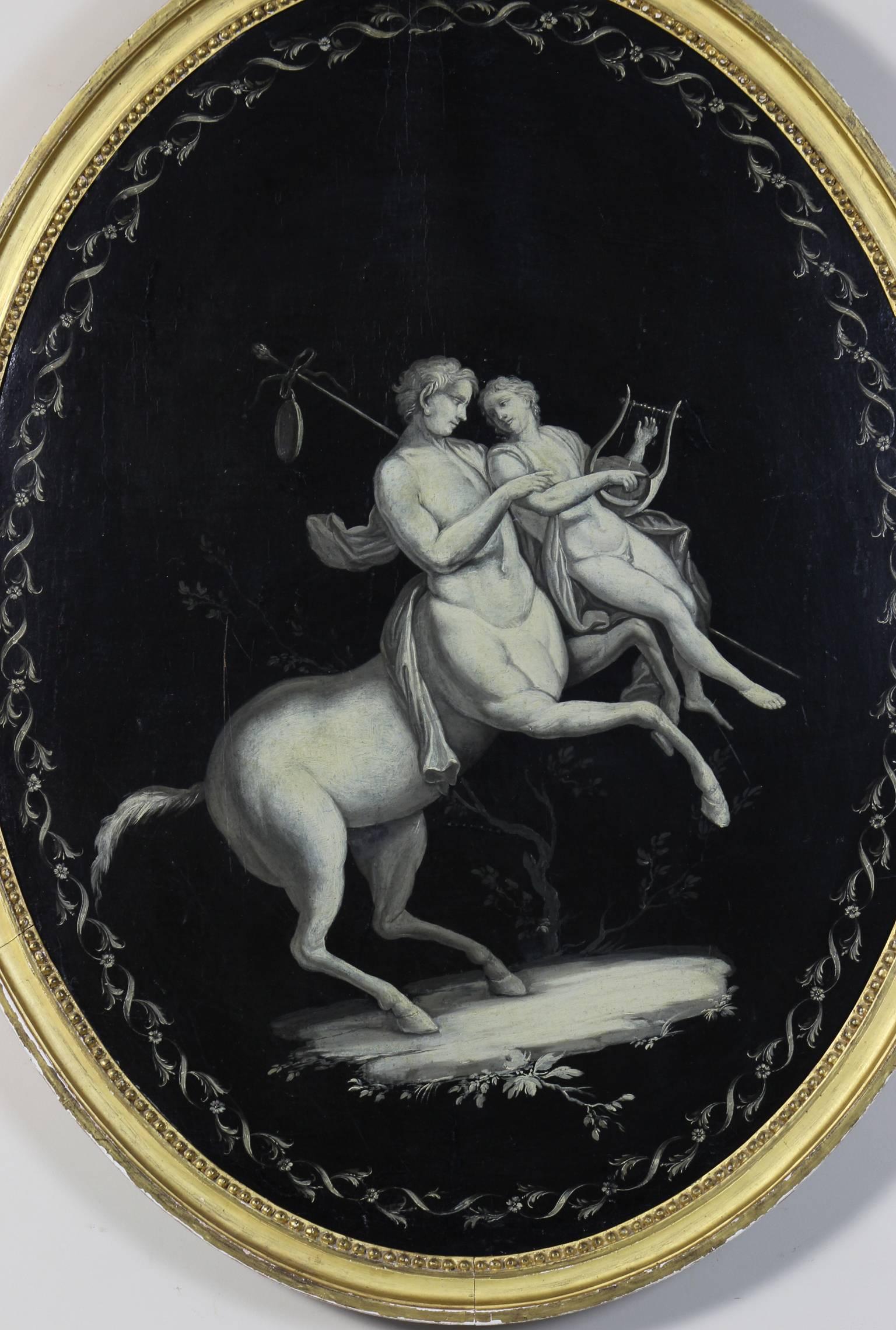 A large oval early 19th century French neoclassical oil on canvas grisaille painting depicting a centaur and maiden in original carved giltwood frame.