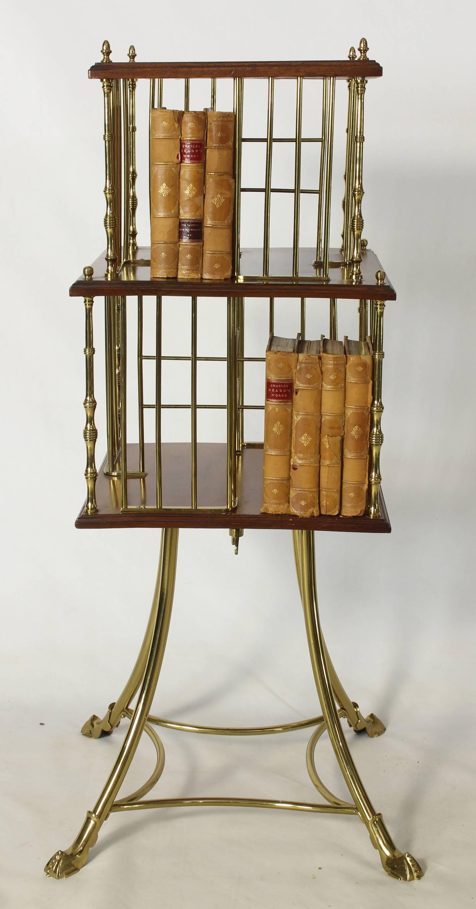 An English Edwardian brass and mahogany revolving bookstand.