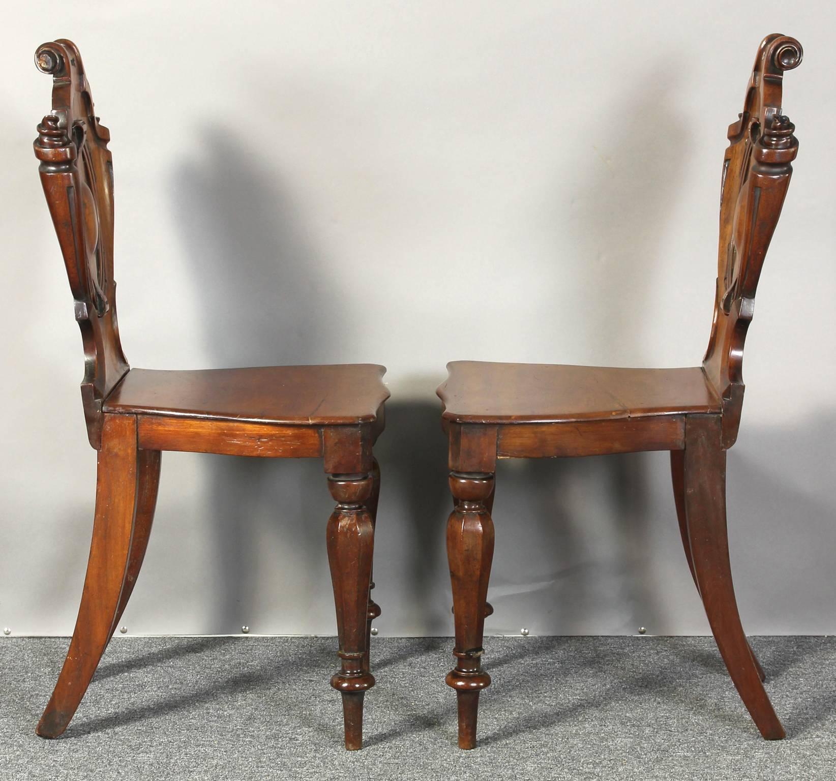 Mid-19th Century Pair of English William IV Carved Mahogany Hall Chairs
