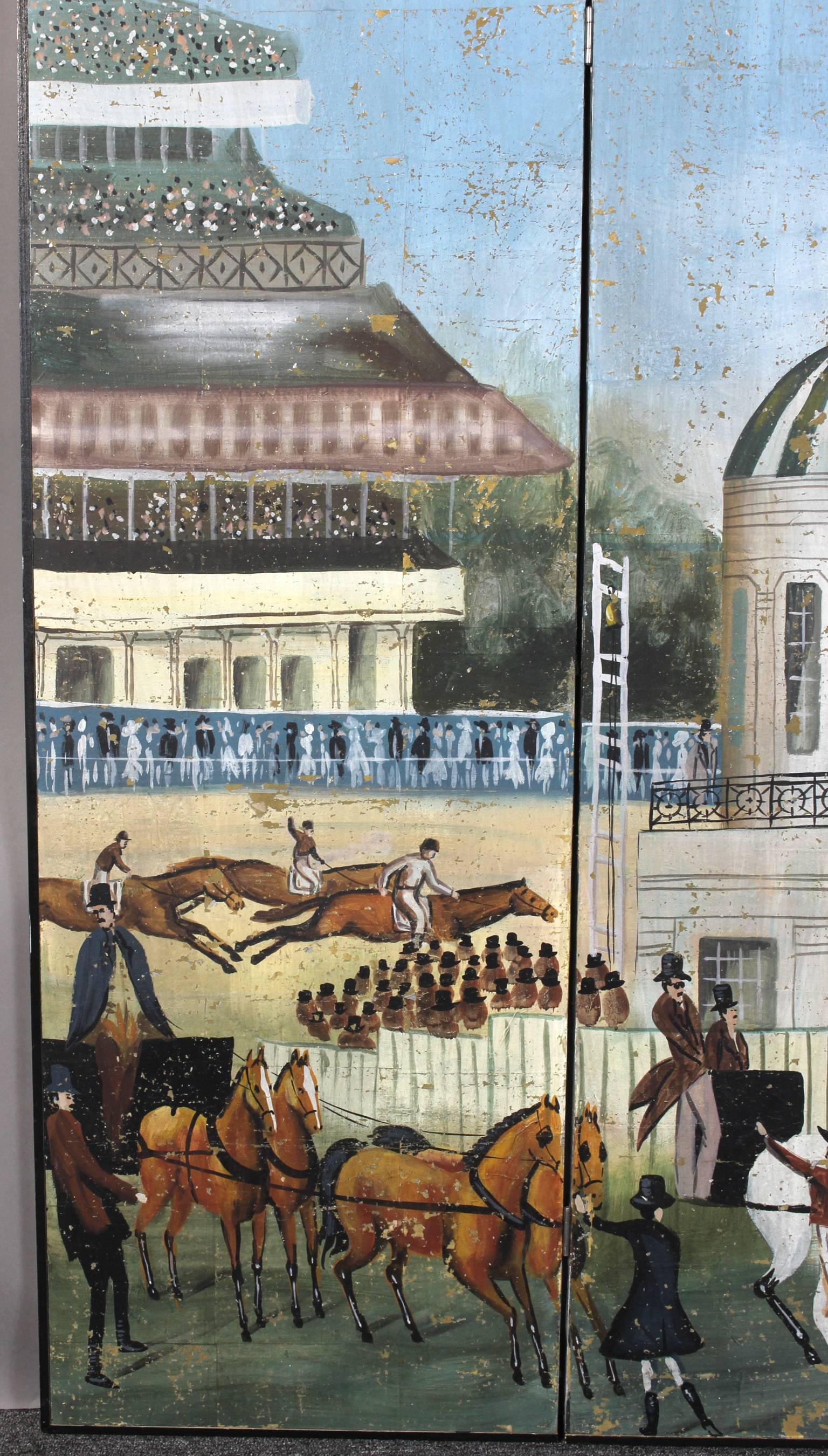 A charming hand-painted four panel folding screen depicting an English horse racing scene complete with horses and jockeys, spectators in the foreground and a large grandstand flying the Union Jack.