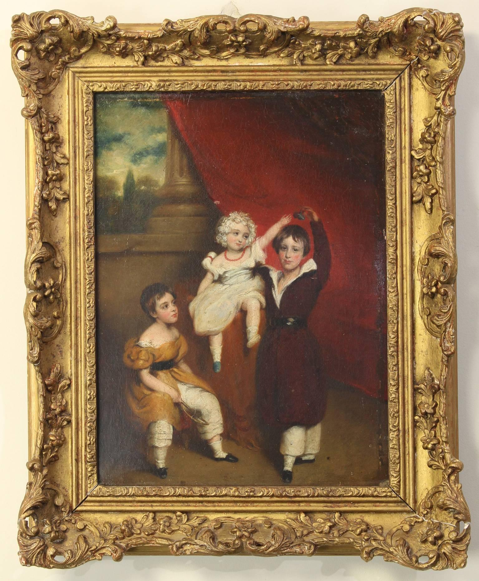 An early 19th century English oil on canvas group portrait of three siblings in a draped landscape setting with original giltwood frame.