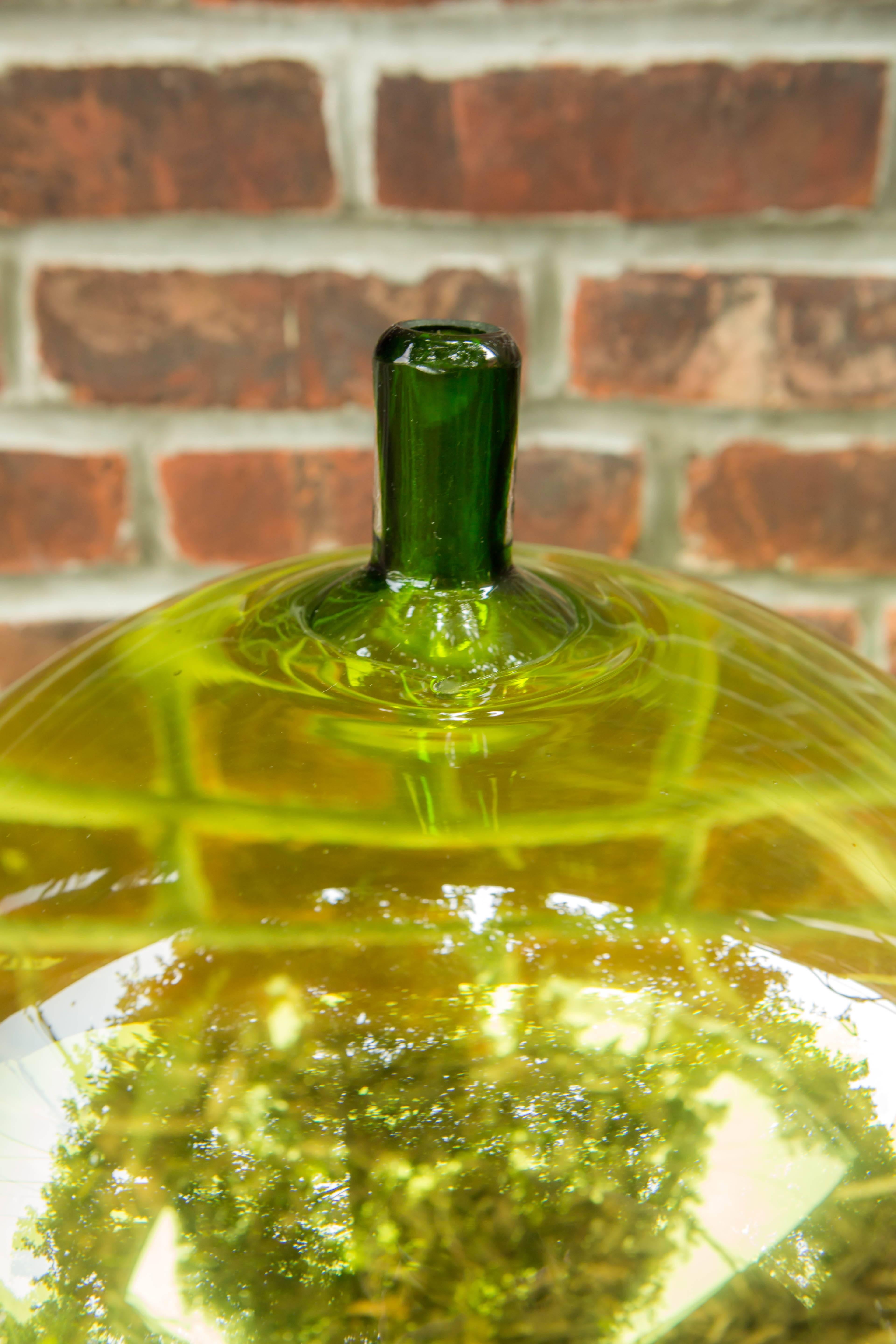 A Swedish Mid-Century Modern blown glass green 