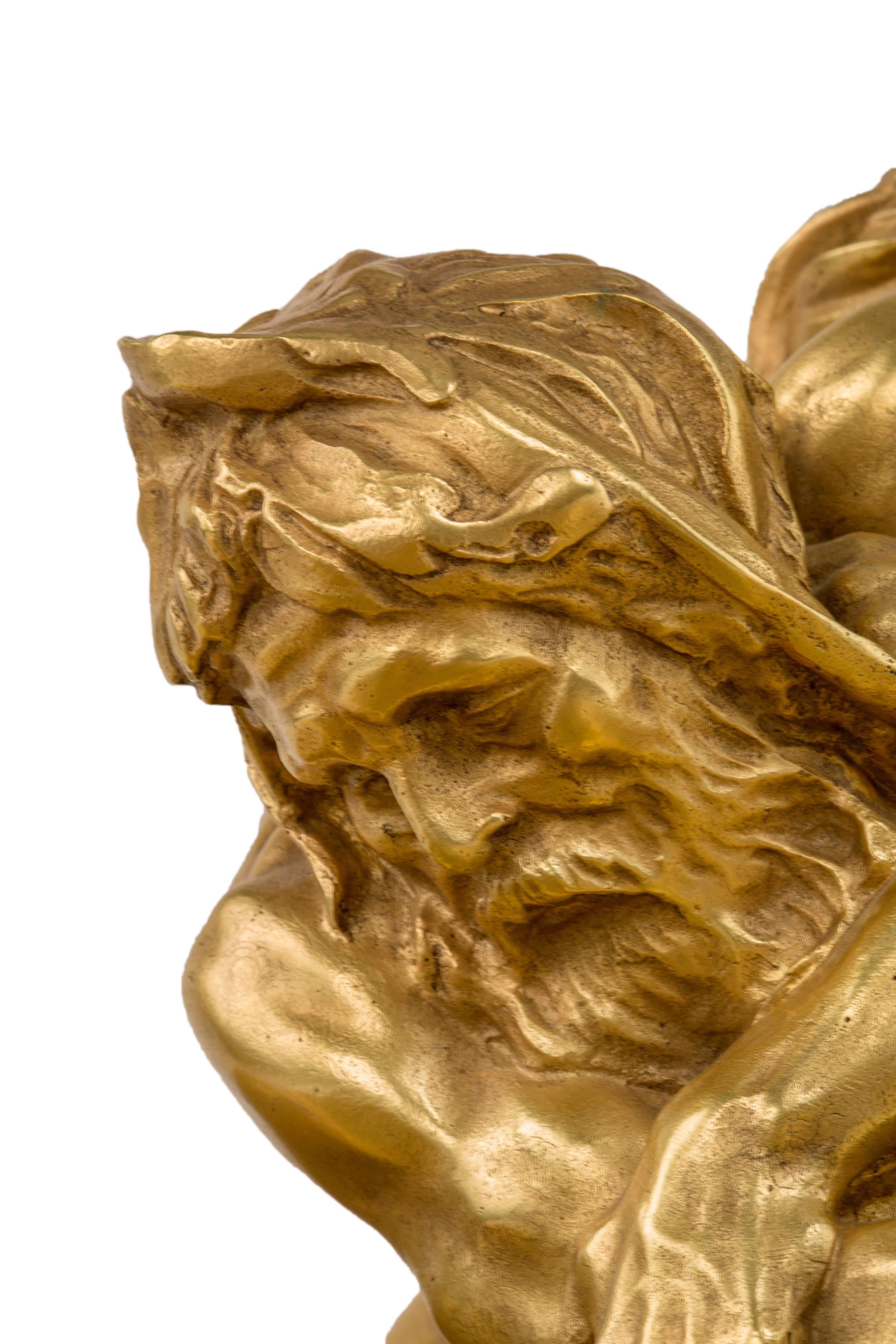 A late 19th century French gilded cast bronze vide-de-poche 