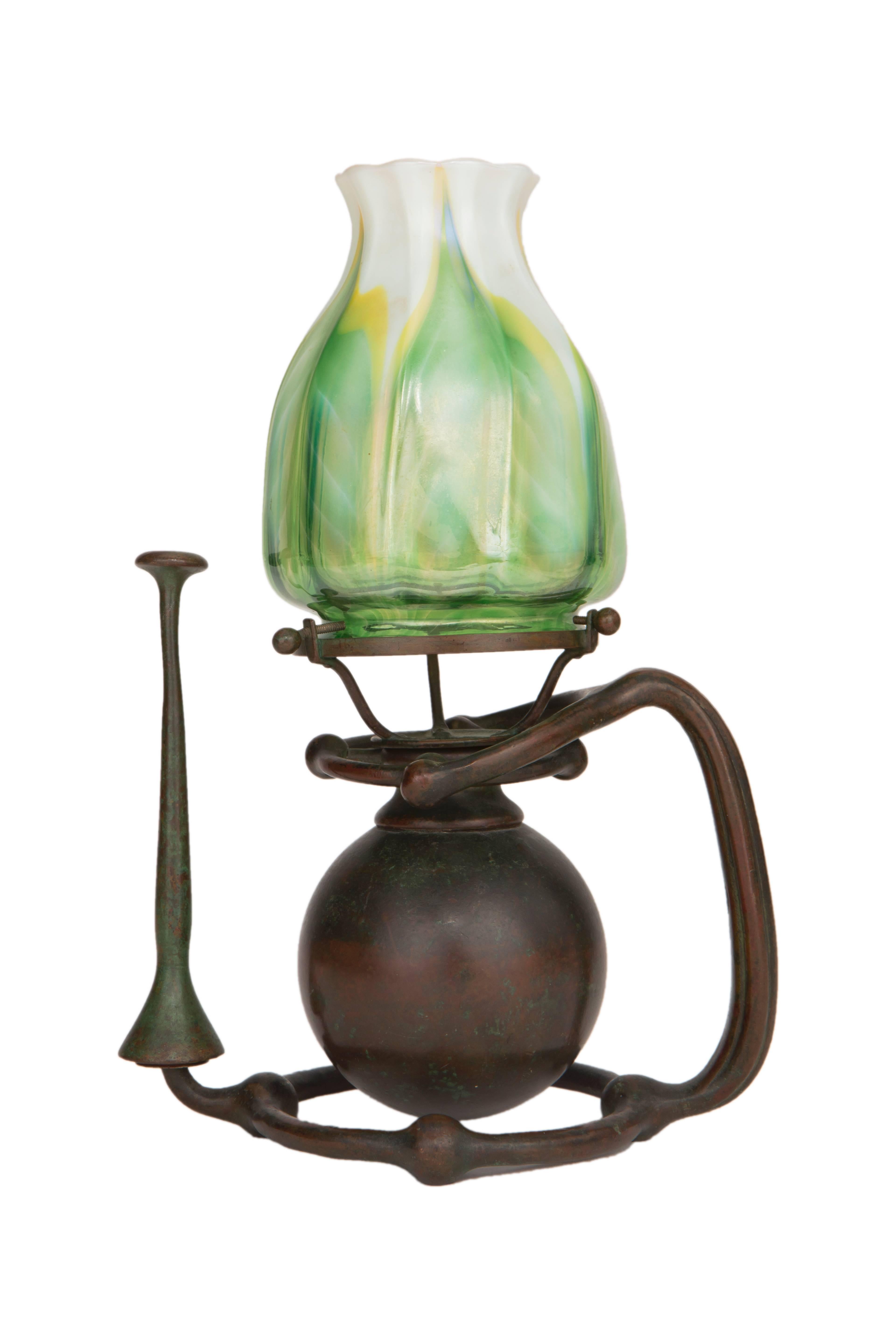 An exceptionally rare American Art Nouveau patinated bronze and glass 