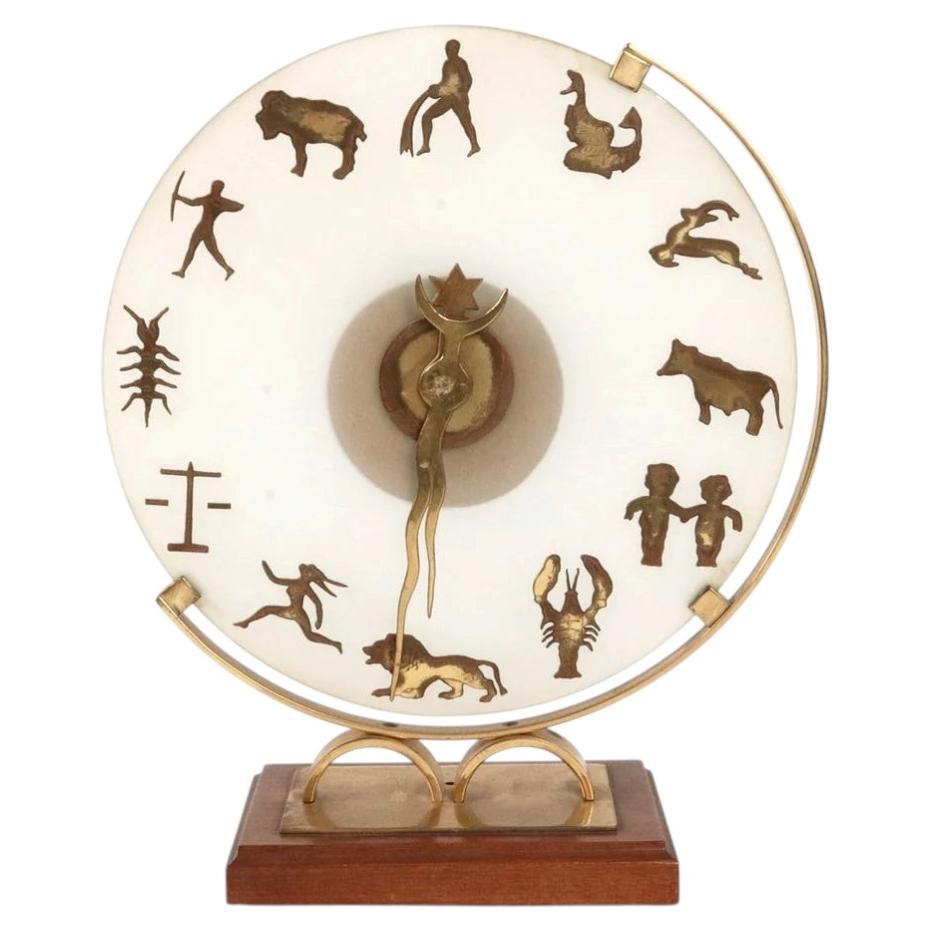 Art Deco table clock with zodiac symbols. England circa 1930's-1940's. For Sale