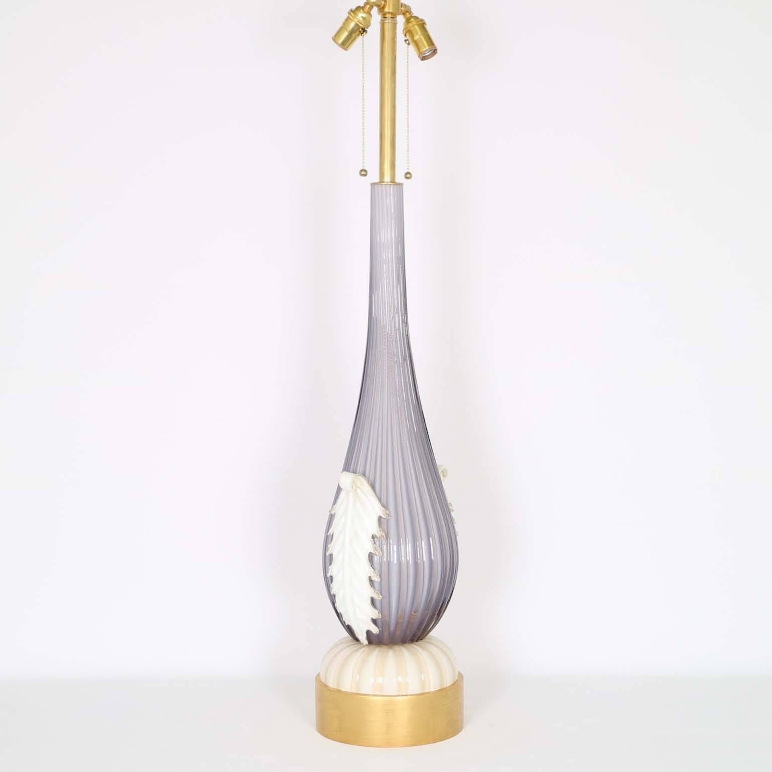 Monumental Mid-Century Modern Murano glass lamp by Barovier in lavender color with accents in off-white, infused with gold flecks. Absolutely stunning with a new base in 24k gold leaf. The noted height is to the finial. The height to the top of the