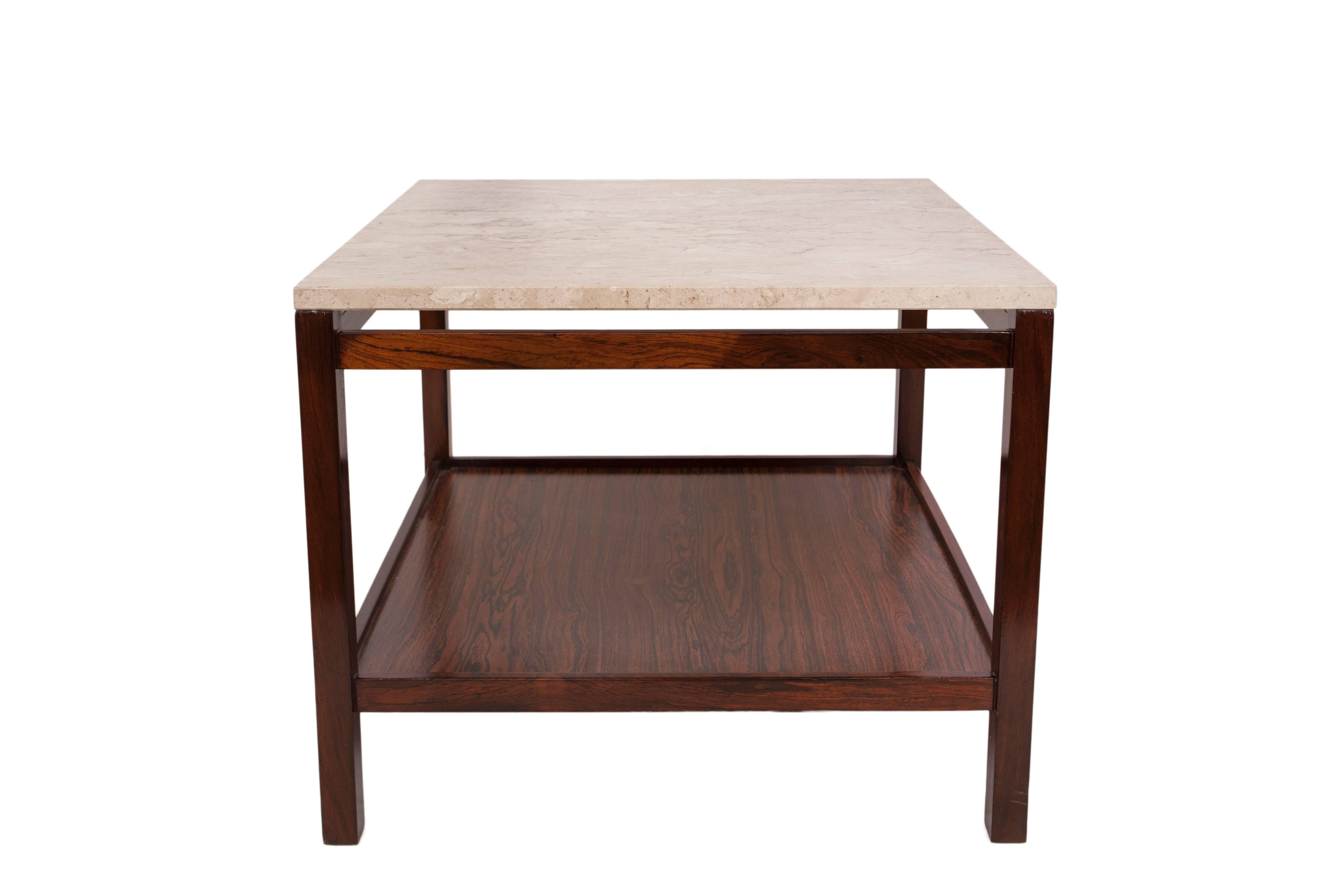 A modernist, circa 1960s side table, with marble top on rectilinear base in Brazilian jacarandá wood with lower shelf. This table remains in very good vintage condition, consistent with age and use.