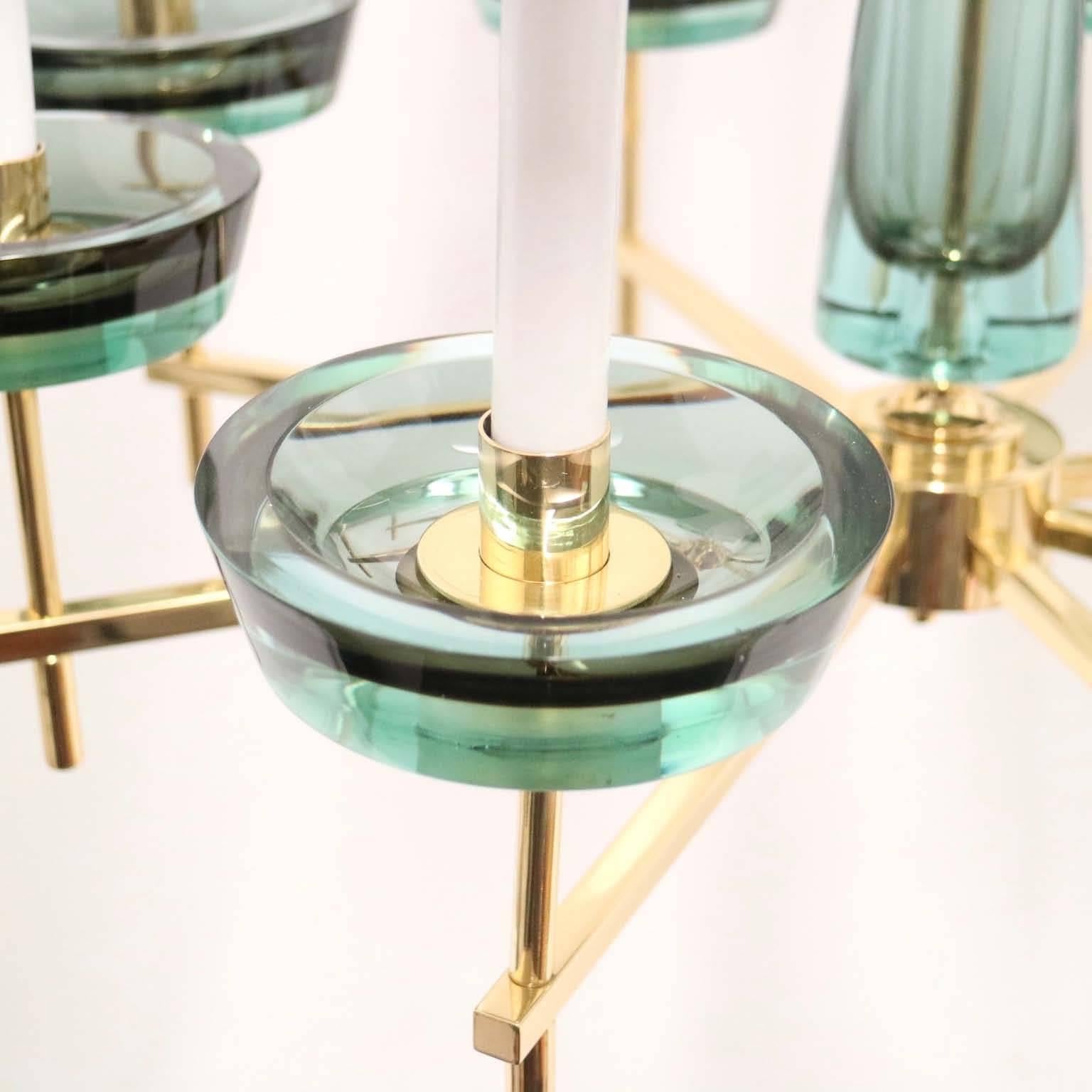 Mid-Century Modern chandelier, attributed to Seguso, with brass frame supporting Alexandrite Murano glass in the Sommerso technique, changing i color in different lighting conditions. Alexandrite will be a pale green under fluorescent lighting and