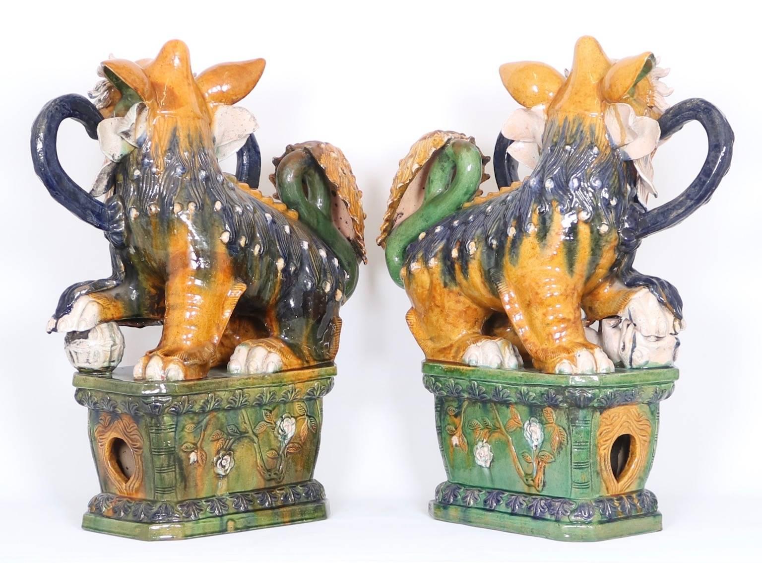 Glazed Pair of Early 20th Century Majolica Foo Dogs