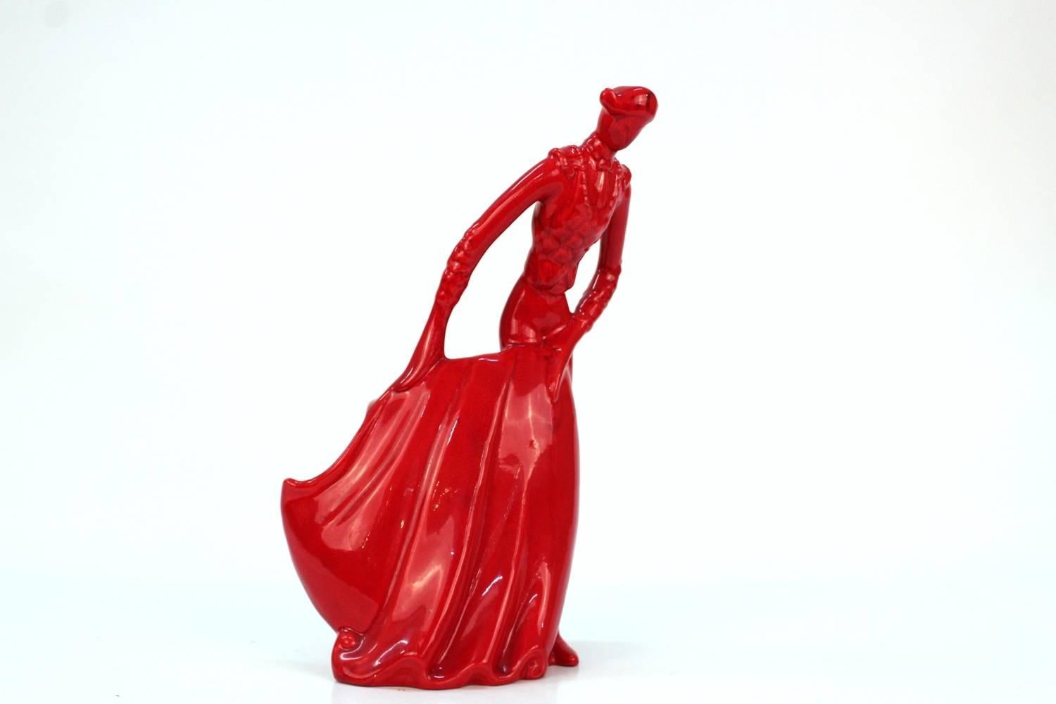 A red glaze matador figure is featured on the front of this vase. 'Royal Haeger/ 502-H is marked on the underside.

110339.

 
