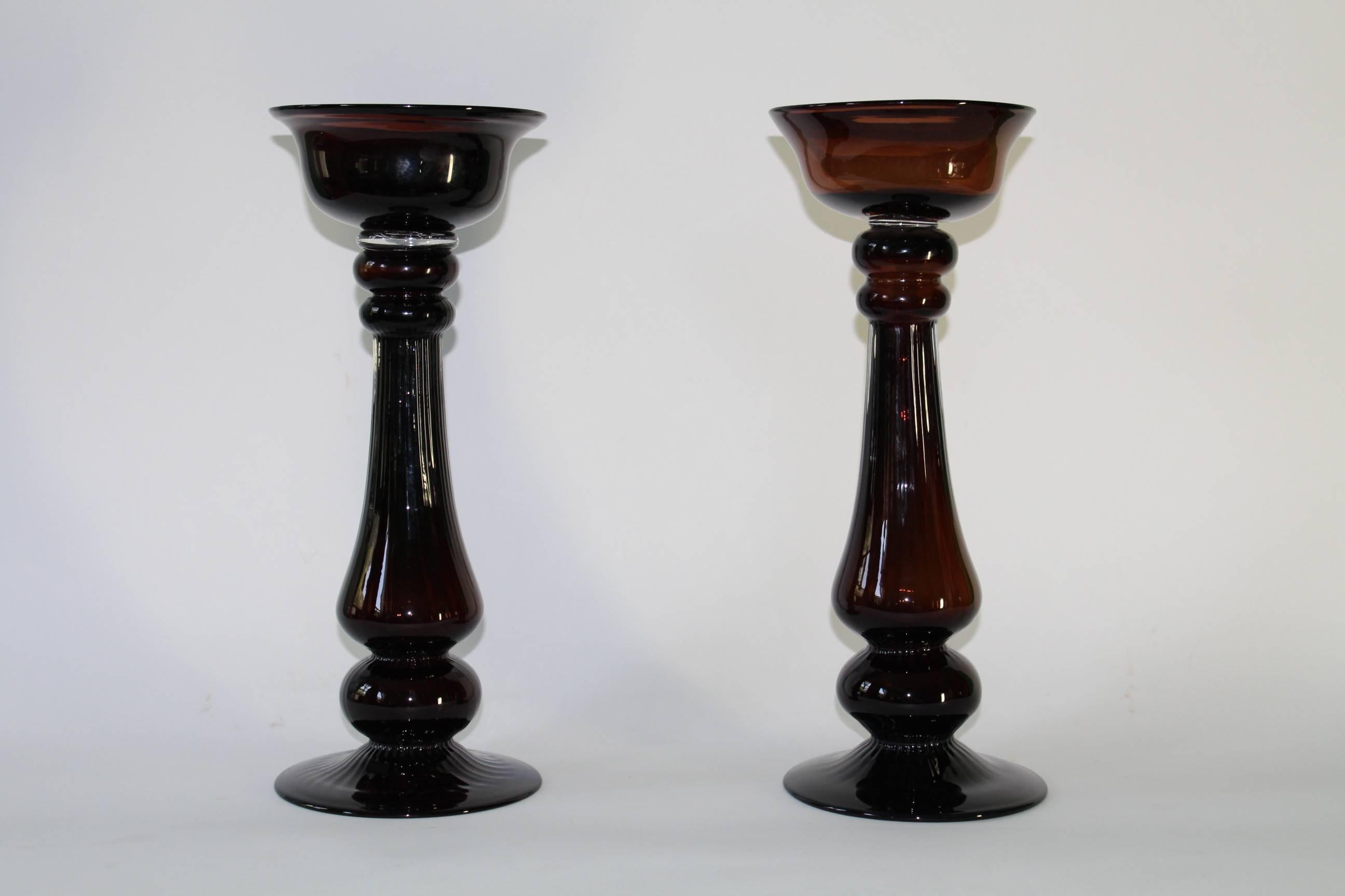 Pair of Mid-Century Modern, circa 1950s-1960s candlesticks, baluster form in hand blown brown colored glass. Each may accommodate a single candle 4