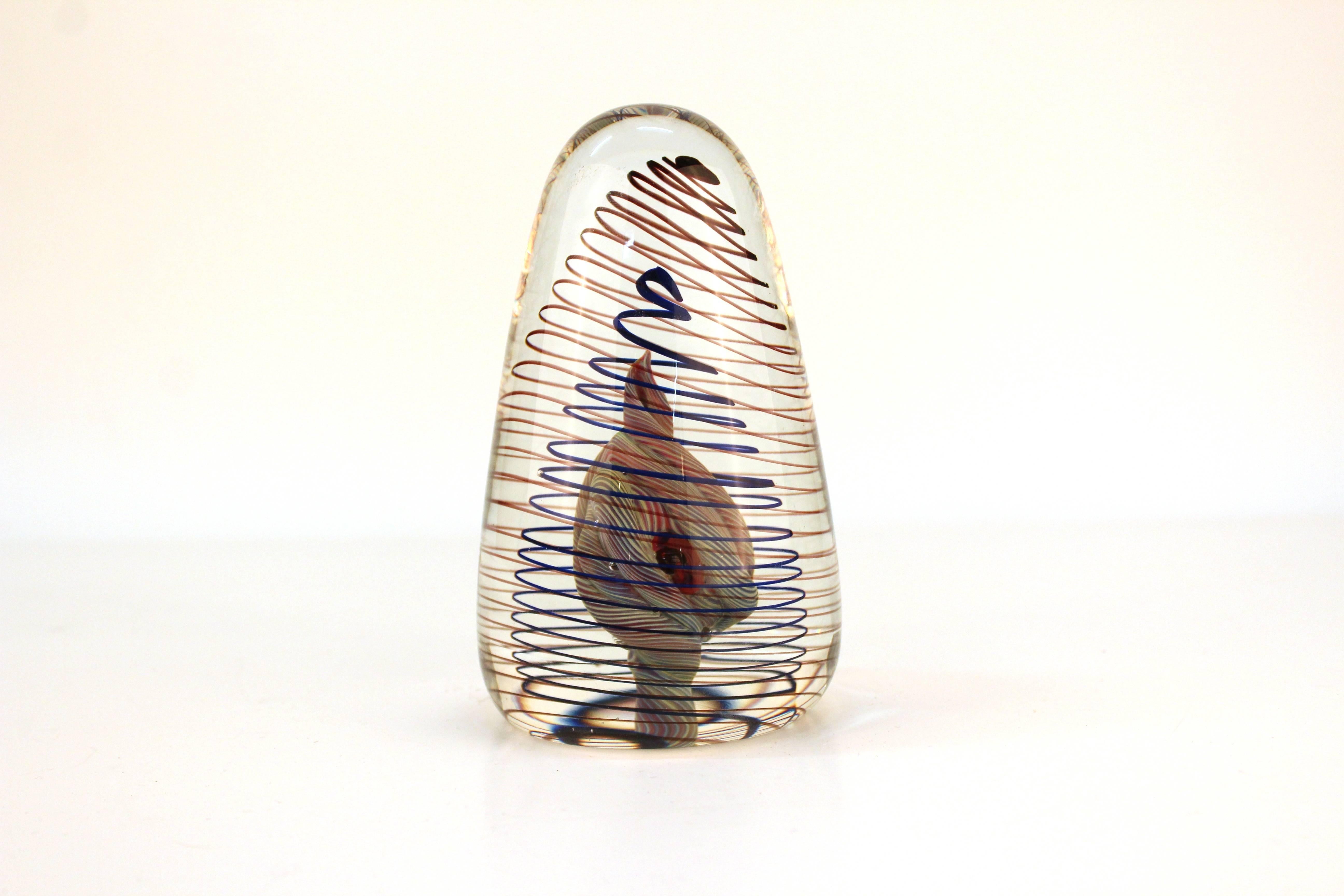 A small spiral optical art glass sculpture or paperweight. Signed on the bottom.

110610

  