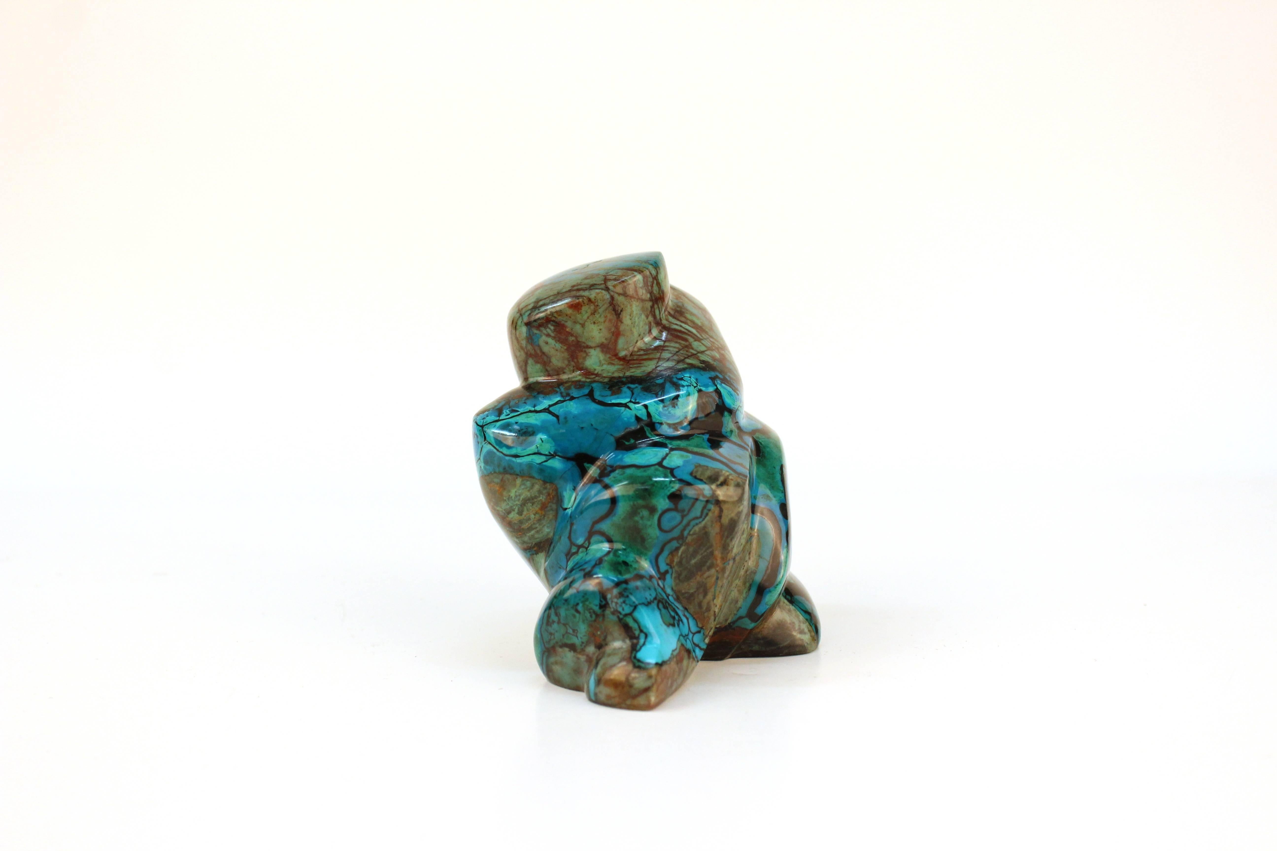 An small abstract carving made of Azurite. 

110609

 