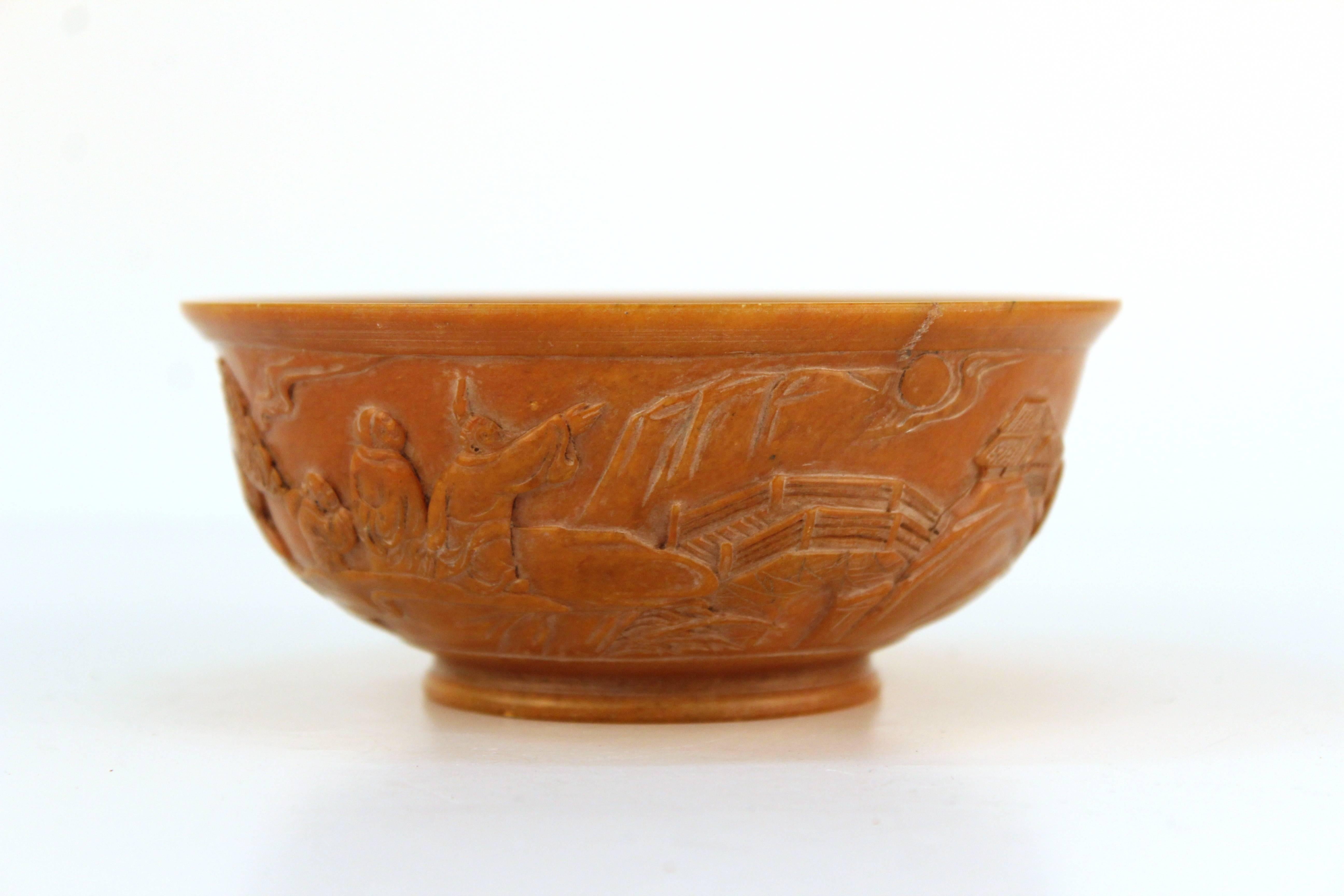 Chinese bowl in a dusty orange soapstone, carved with intricate landscapes. Despite some minor wear the bowl remains in good vintage condition.

110619

 