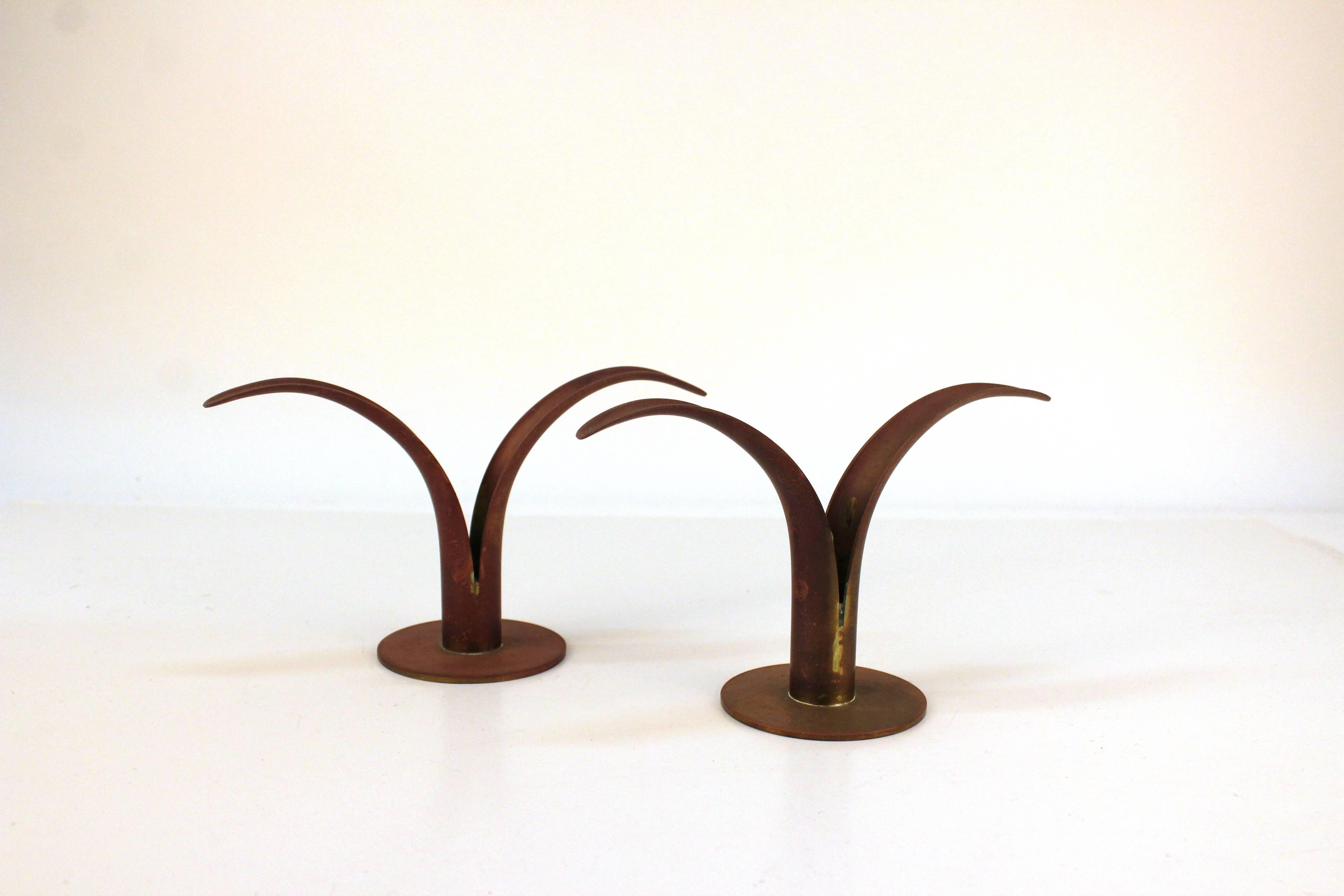 Pair of Scandinavian Ystad-Metall candlesticks in patinated brass. Despite some appropriate wear due to age and use the candlesticks remain in overall good vintage condition. A second pair is available for purchase.

110620

 
