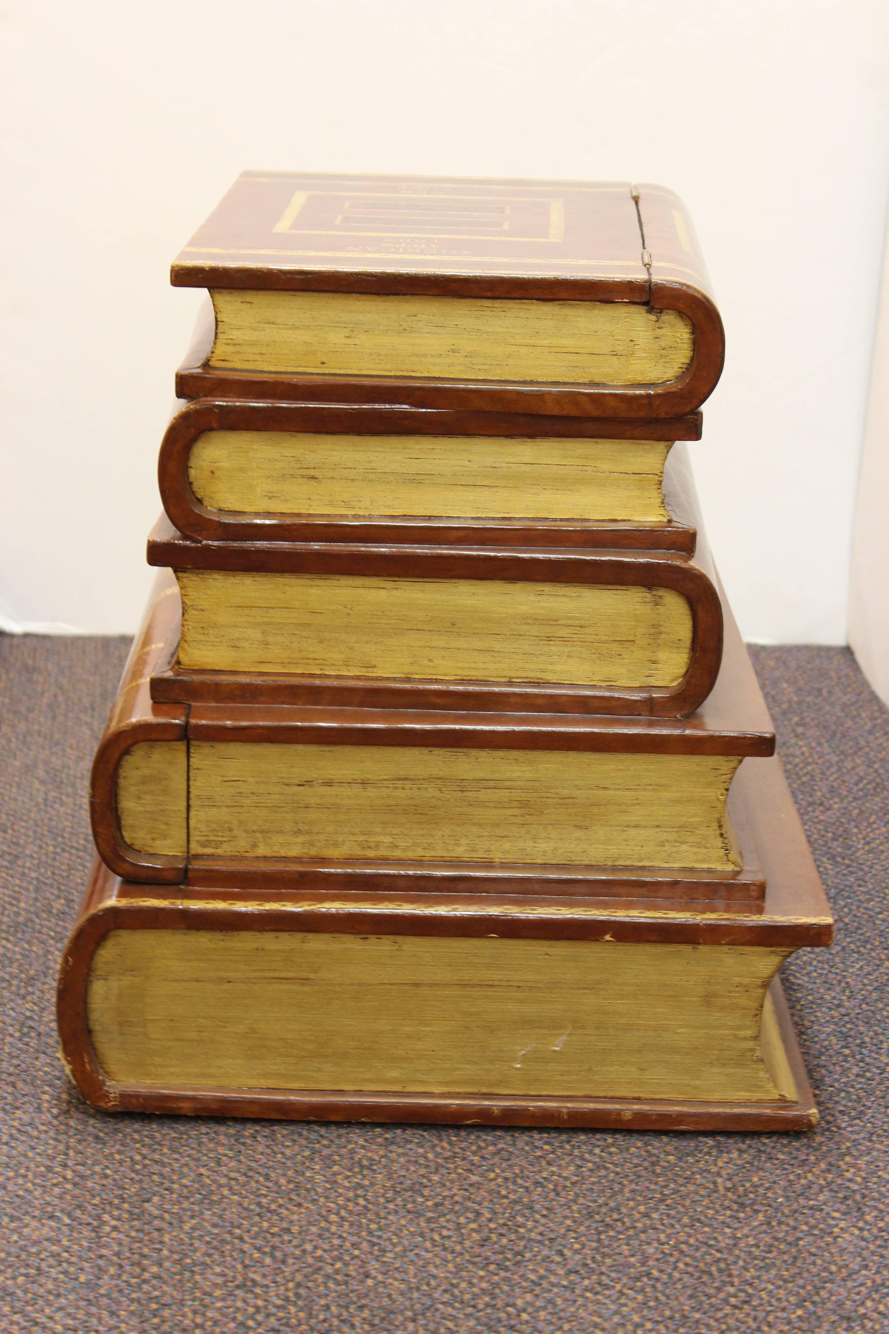 A Maitland Smith end table in the form of stacked leather books. Marked American Arts, 1887, New York, Maitland Smith. Despite some wear to the bottom corner the table remains in good vintage condition.

 