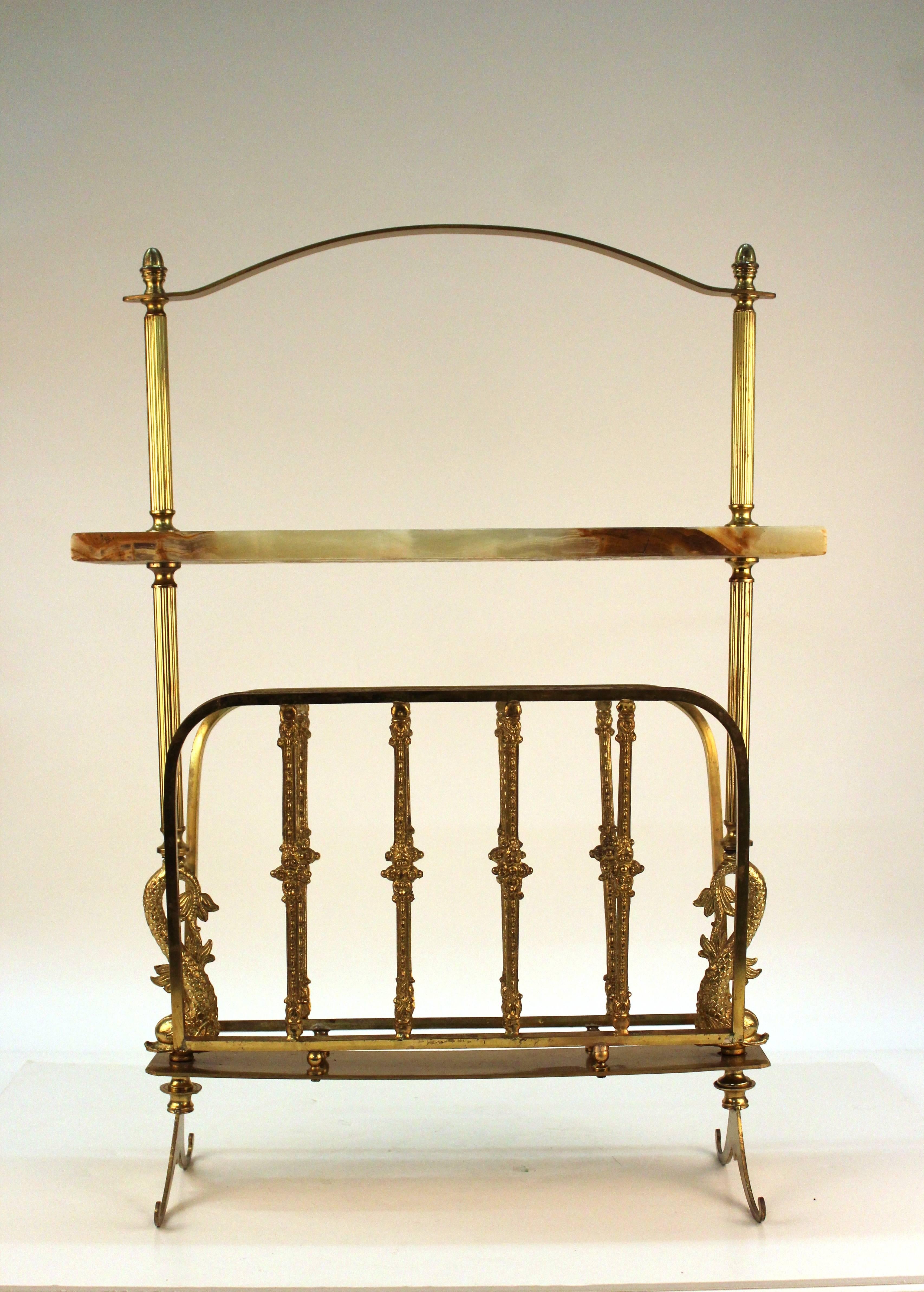 Mid-Century magazine rack made in Italy during the 1950s with brass and onyx.