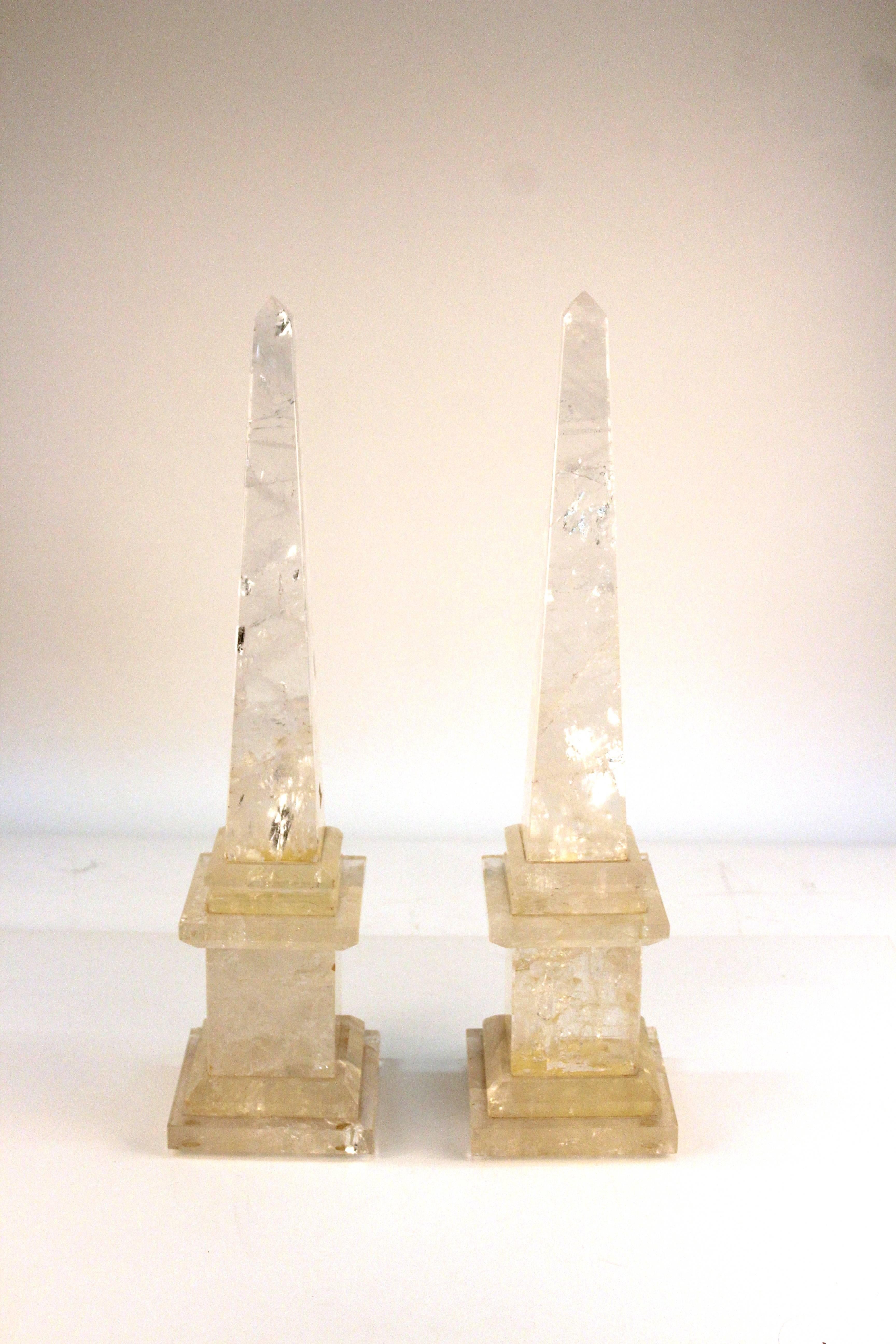 Pair of decorative obelisks in Brazilian quartz crystal.
