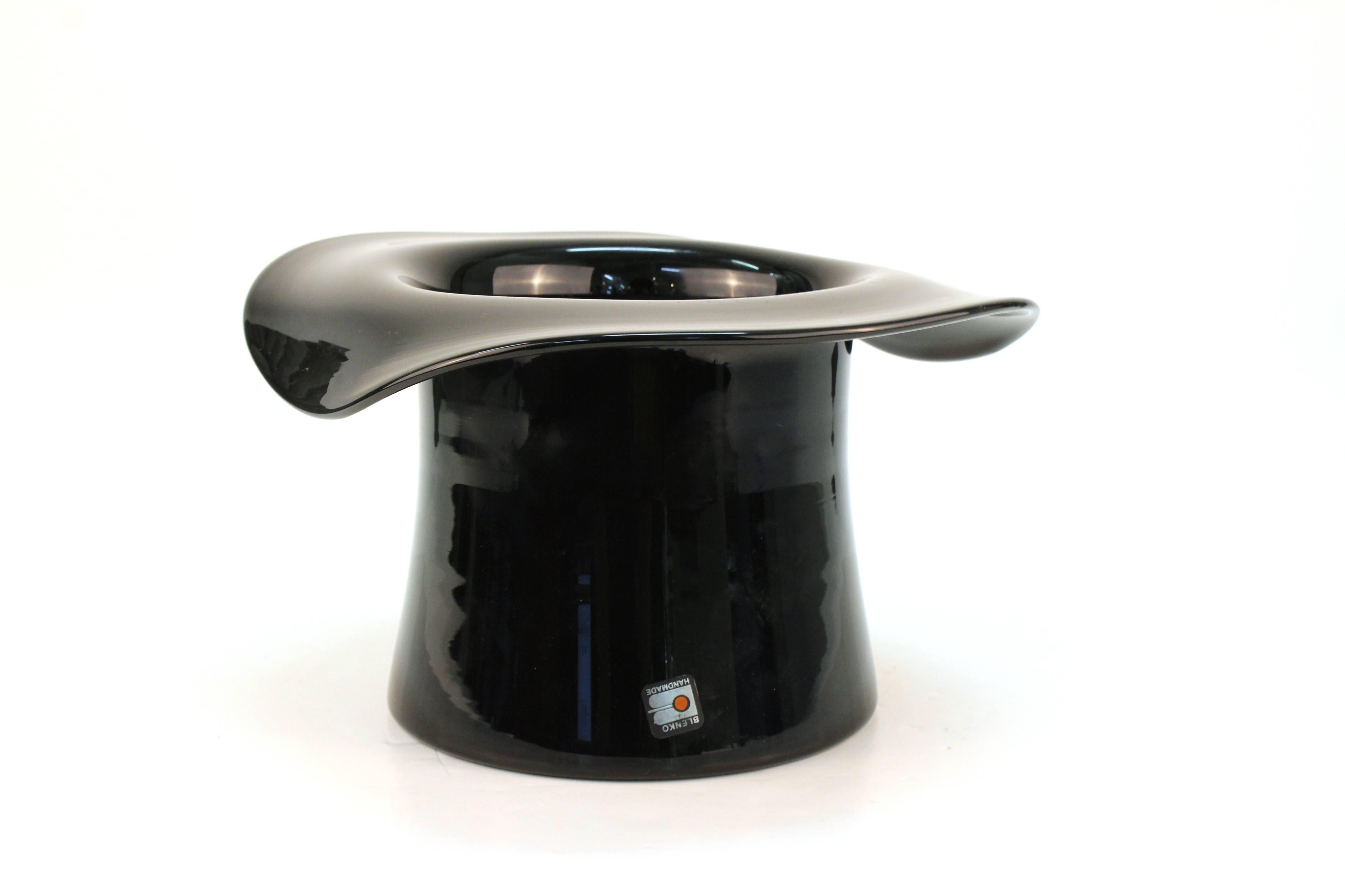 A black handblown glass wine or champagne bucket in the shape of a top hat by Blenko. Includes a Don Shepherd label. In very good condition.