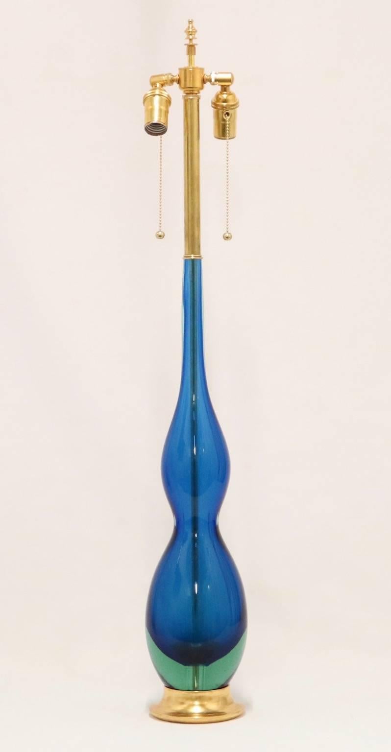 Mid-century modern Murano glass lamp by Flavio Poli for Seguso using Sommerso technique. Alexandrite has been applied to the glass to make it change color from green to purple in reaction to changes in light. The lamp has been mounted in a gilded