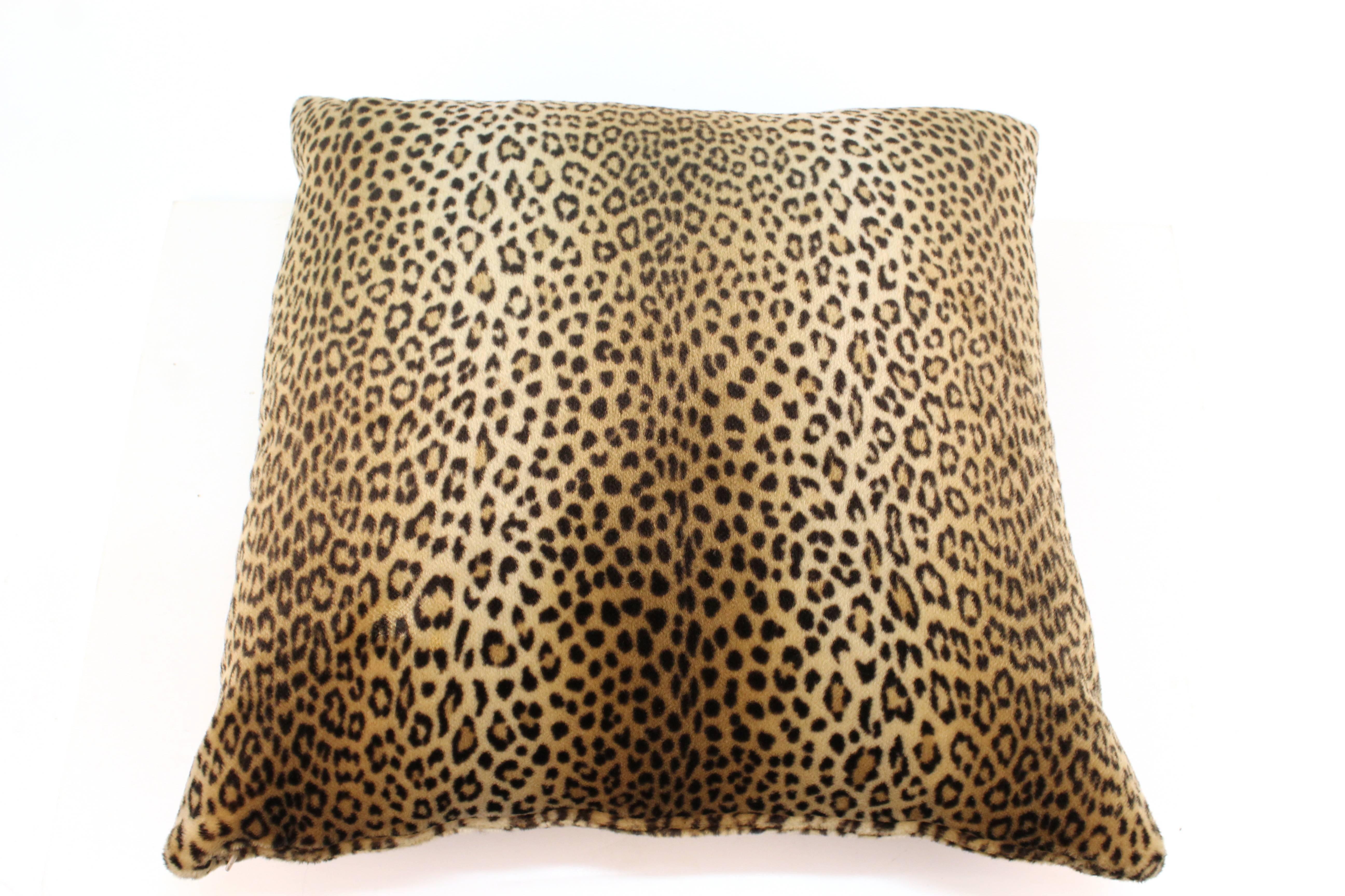 Four large pillows in a synthetic textile with leopard print pattern. In excellent vintage condition consistent with age and use. 111282. 

Available as a set or for $250 each.