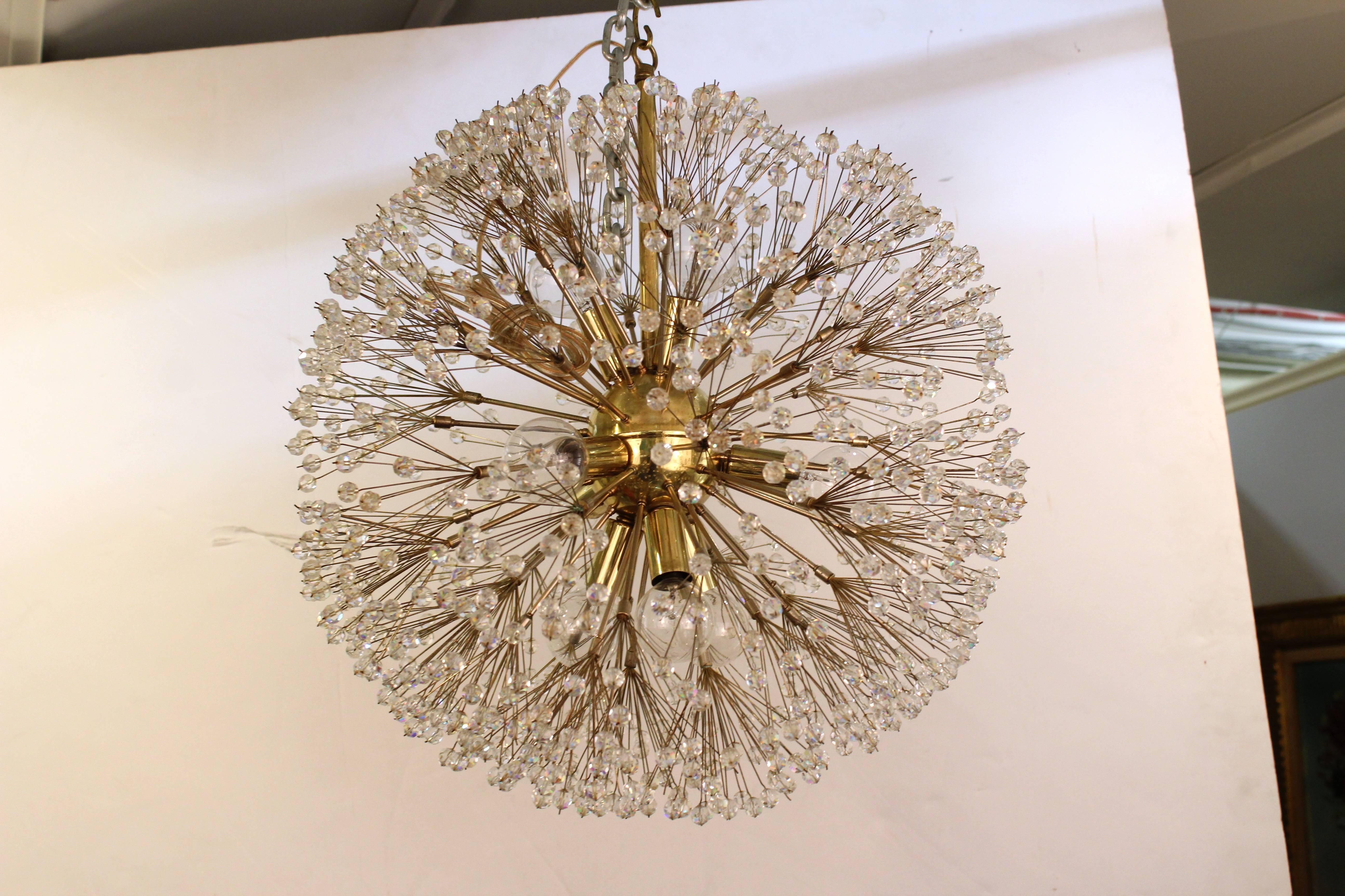 Sputnik chandelier by Emil Stejnar. Styled with many beaded crystal arms. Beads are mounted on a brass frame. Despite some patina and age spots the chandelier is in good vintage condition. The wiring has recently been checked.