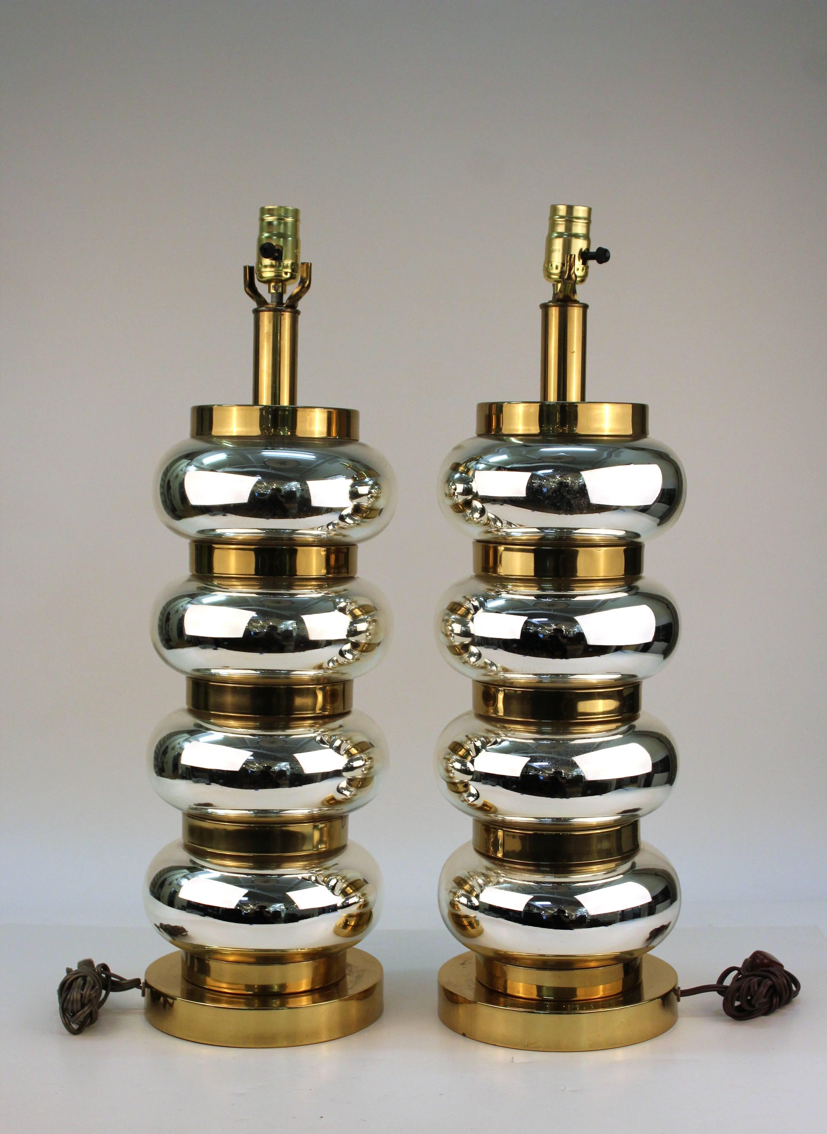 Pair of stacked bubble lamps in chrome. Features gold-tone accents and a polished finish. The lamps are in good condition.