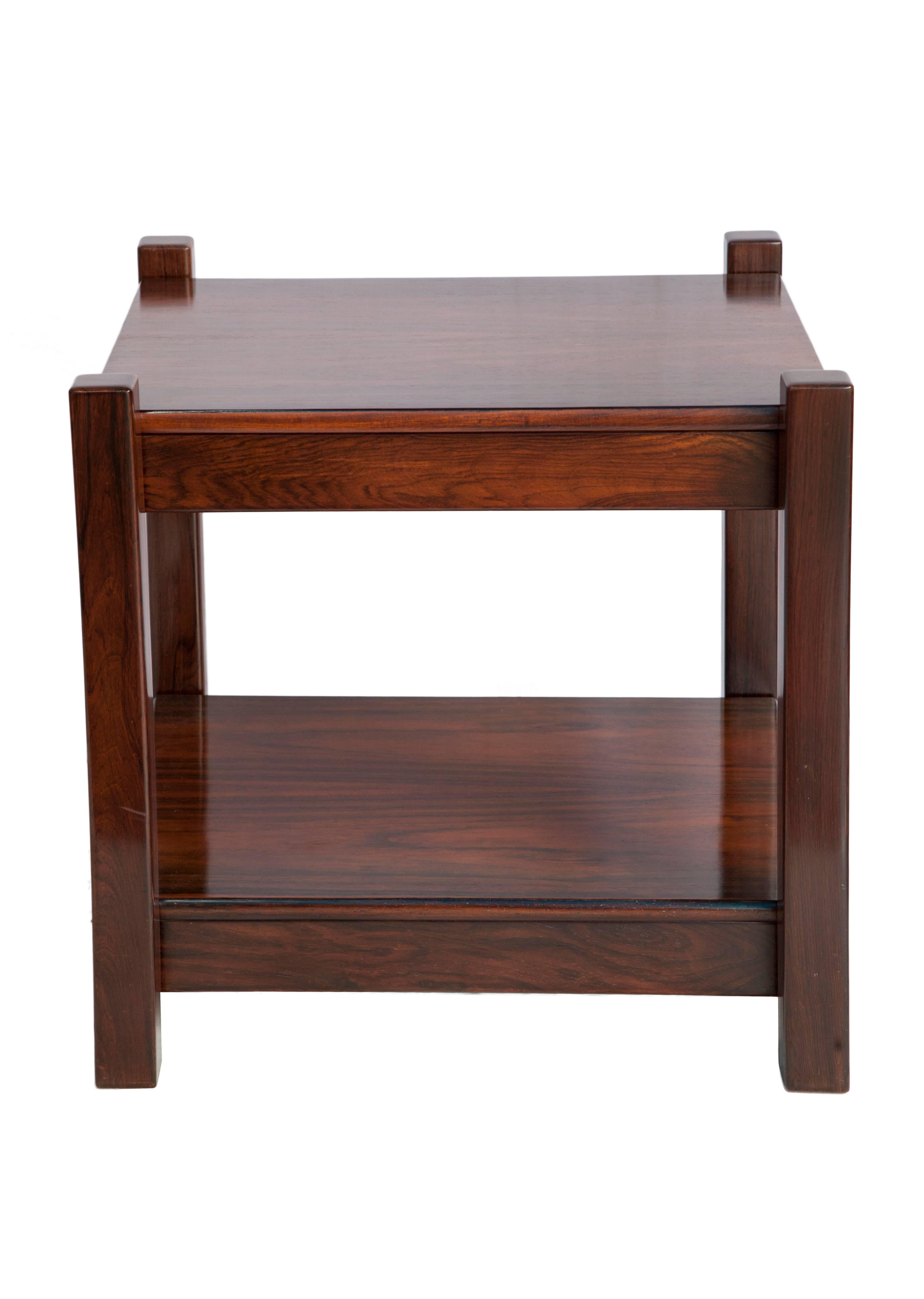 A Mid-Century Modern side table crafted in Brazilian Jacaranda wood, made in Brazil, circa 1960. In good vintage condition, with wear consistent to age and use.