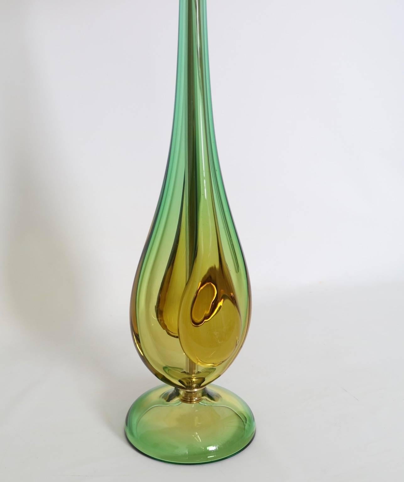 Italian Murano Sommerso glass lamp by Seguso in green and amber. This midcentury lamp is fully restored and has all new wiring and hardware, including a double socket cluster. This lamp is in excellent vintage condition and has wear consistent with