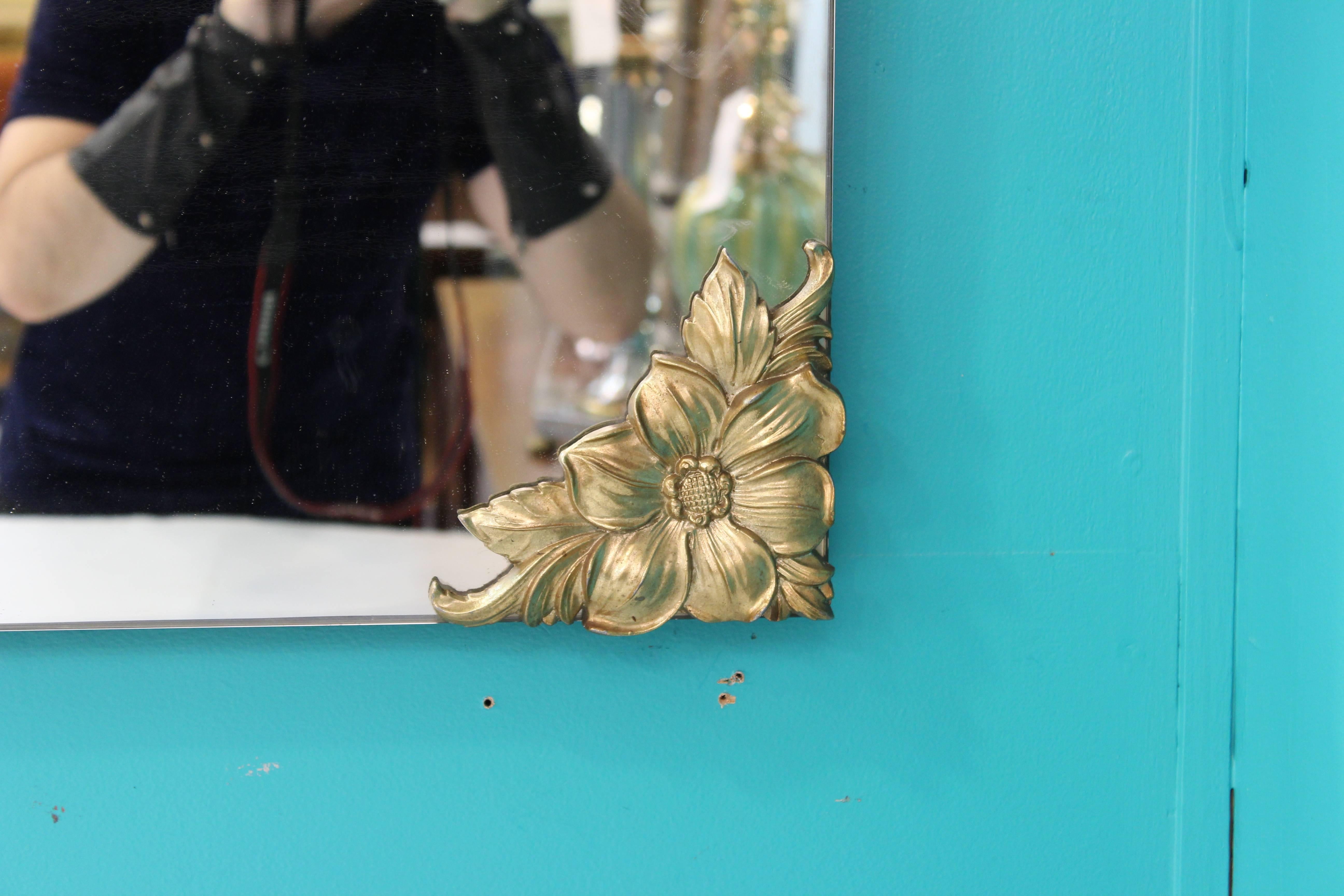 Hollywood Regency Mirror with Brass Floral Decorated Corners In Good Condition In New York, NY
