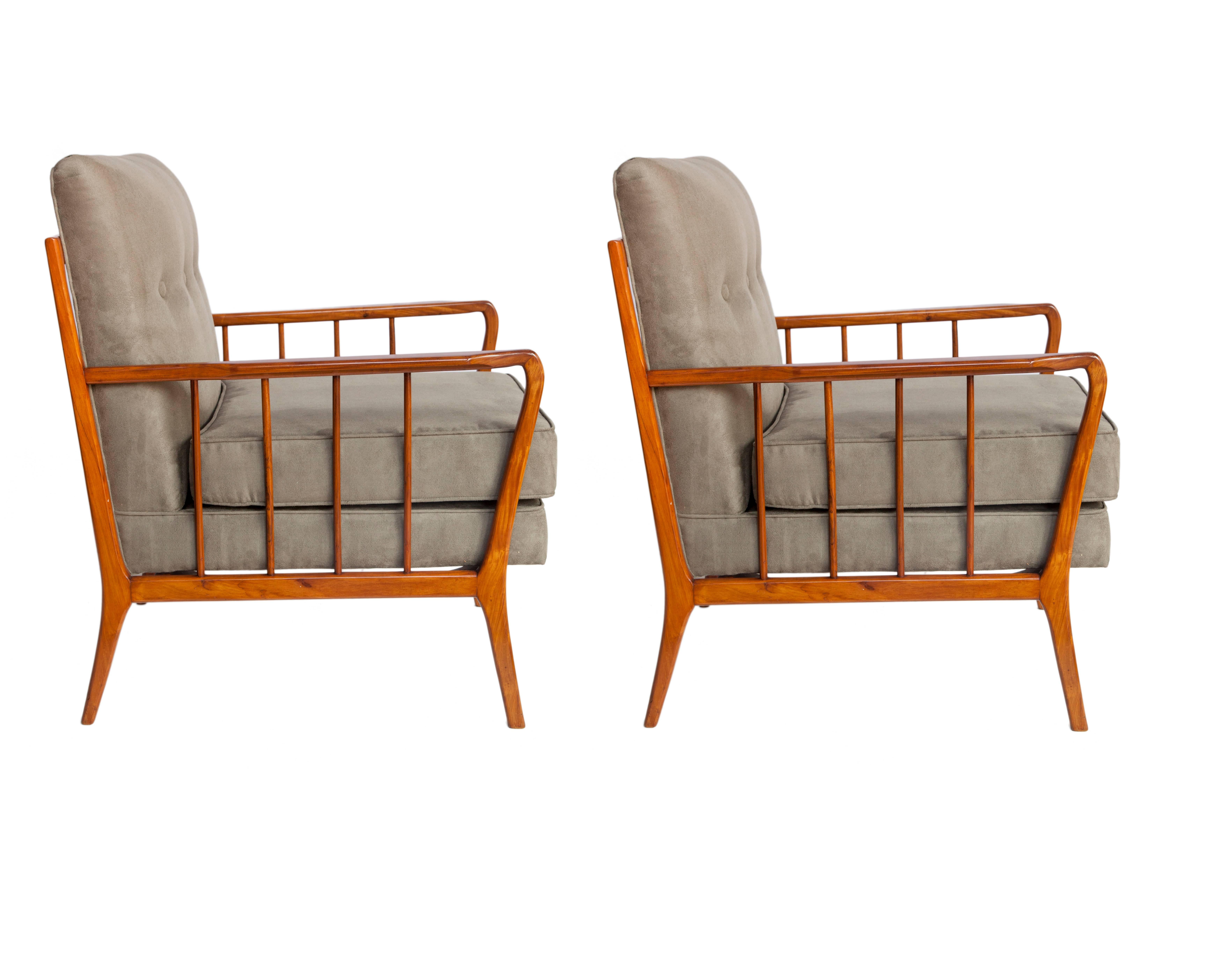 Pair of Rino Levi Mid-Century Modern armchairs produced in Brazil, during the 1950s. The chair frames are crafted from Brazilian caviuna wood with posted arms and tapered legs. Recently re-upholstered in moss green artificial suede. The chairs