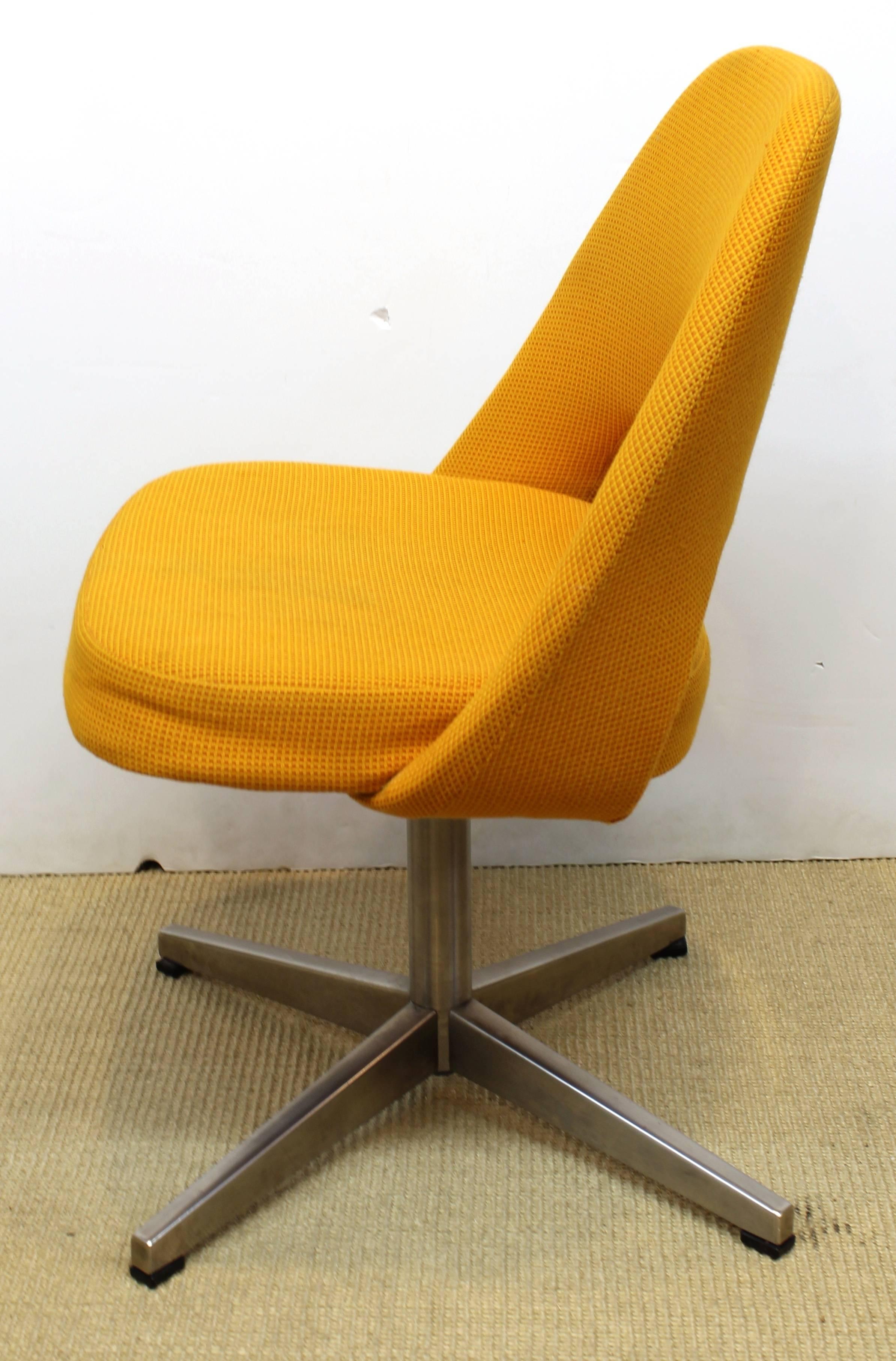 yellow swivel chair