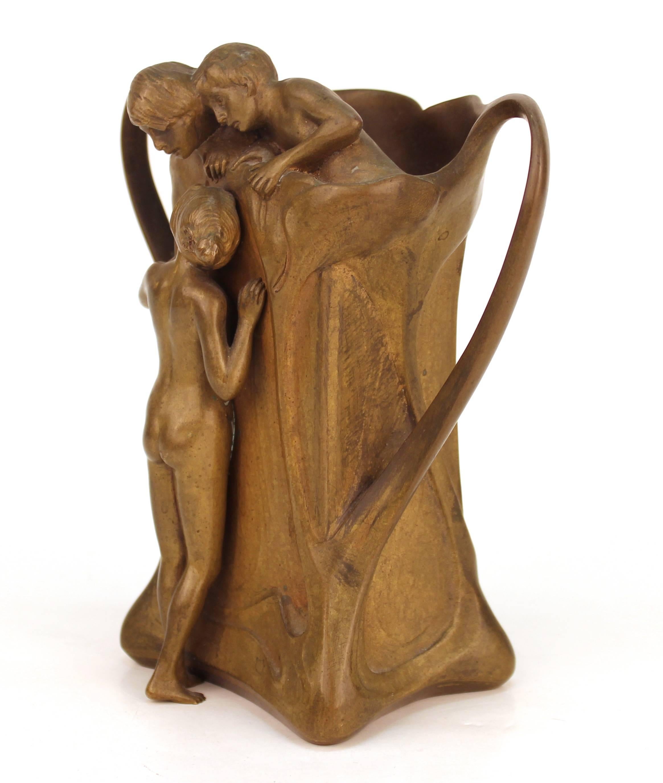 An Austrian Jugendstil - Art Nouveau bronze sculpted vase signed 'H. Babka'. The piece has sculpted nudes and sinuous lines. Fully marked on reverse of base on lower right 