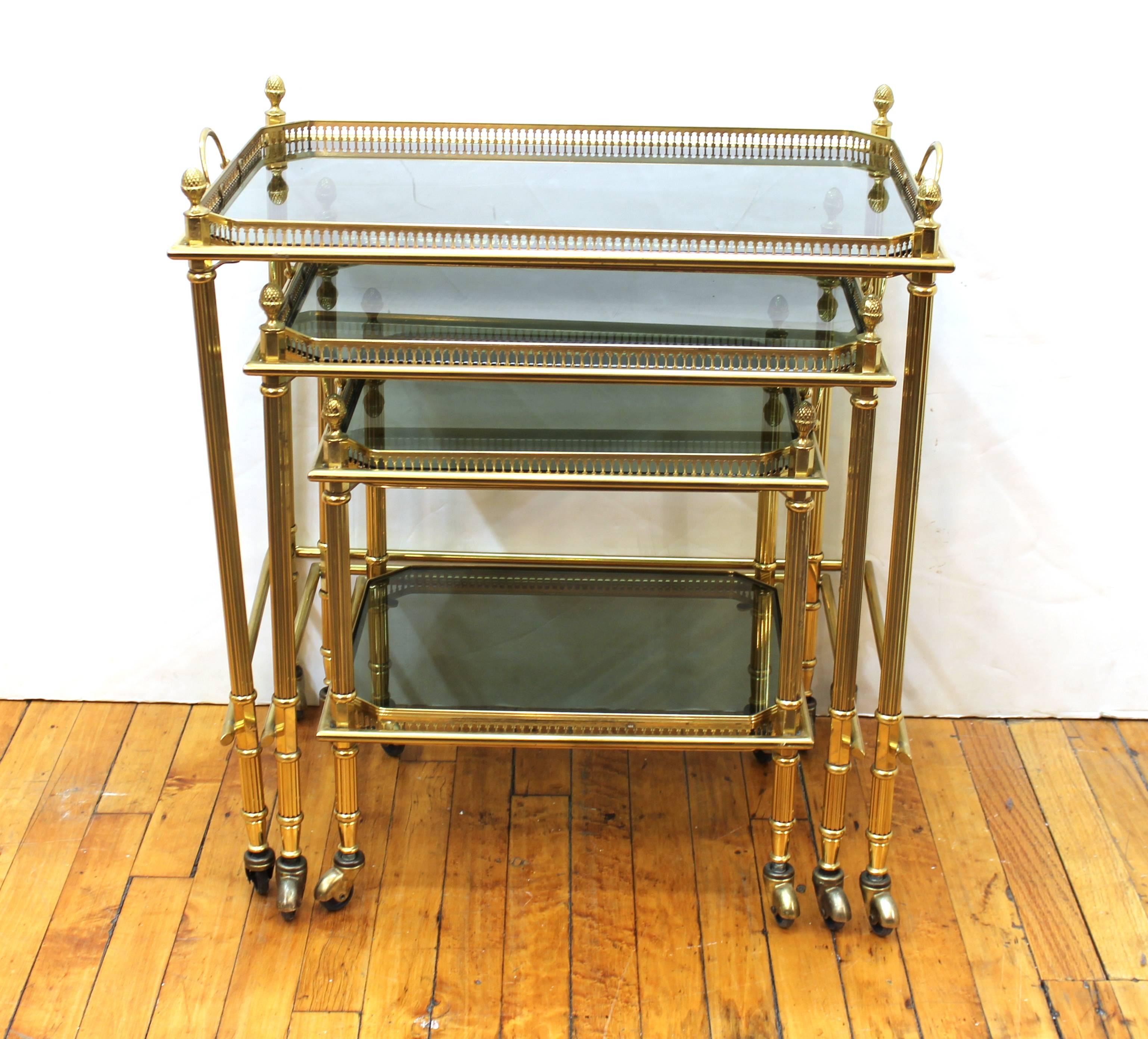 Hollywood Regency Maison Baguès Nesting Tables in Brass and Smoked Glass on Casters
